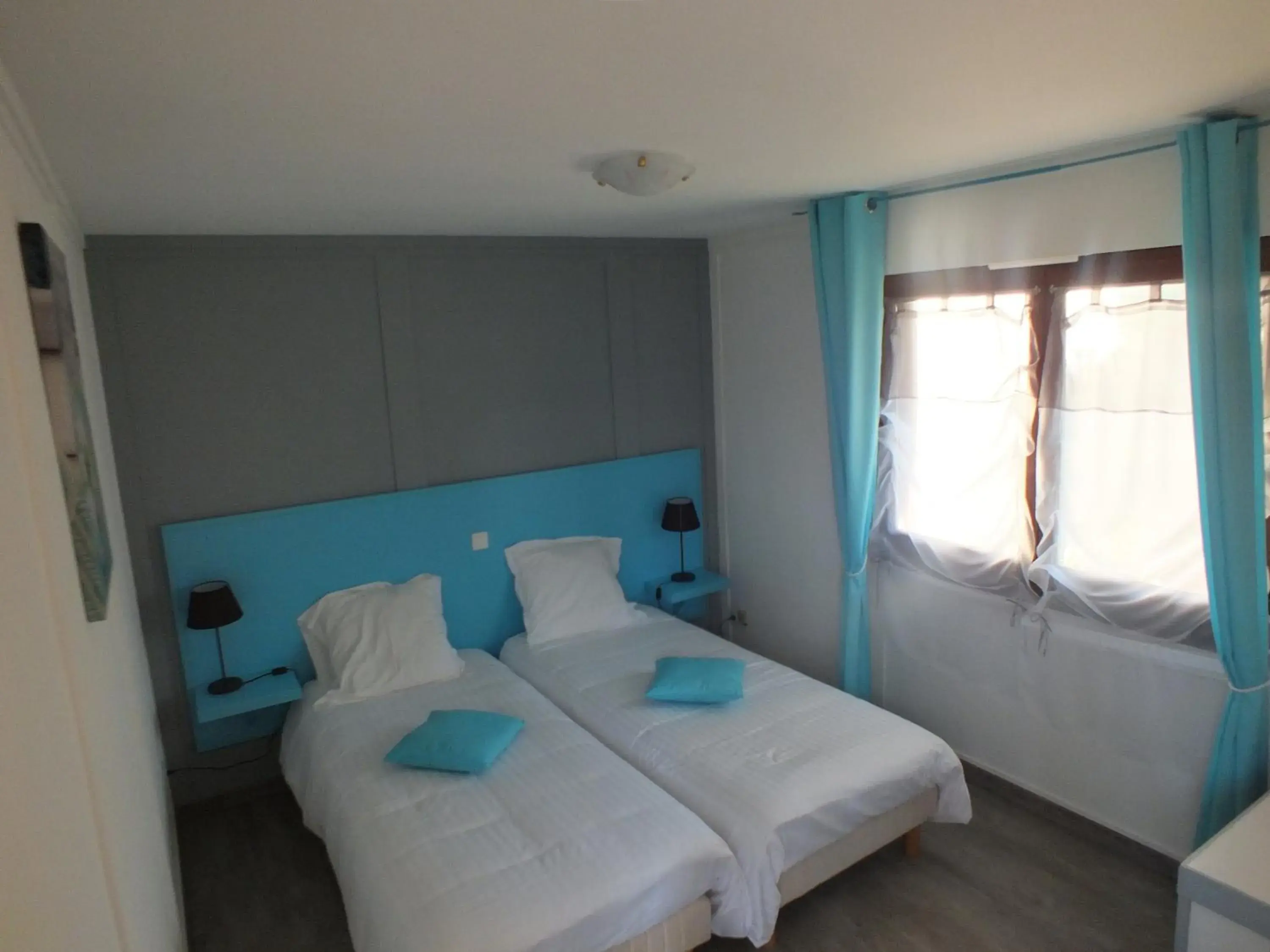 Comfort Twin Room - single occupancy in Hotel Restaurant Le Manguier Comfort Twin Room - single occupancy in Hotel Restaurant Le Manguier