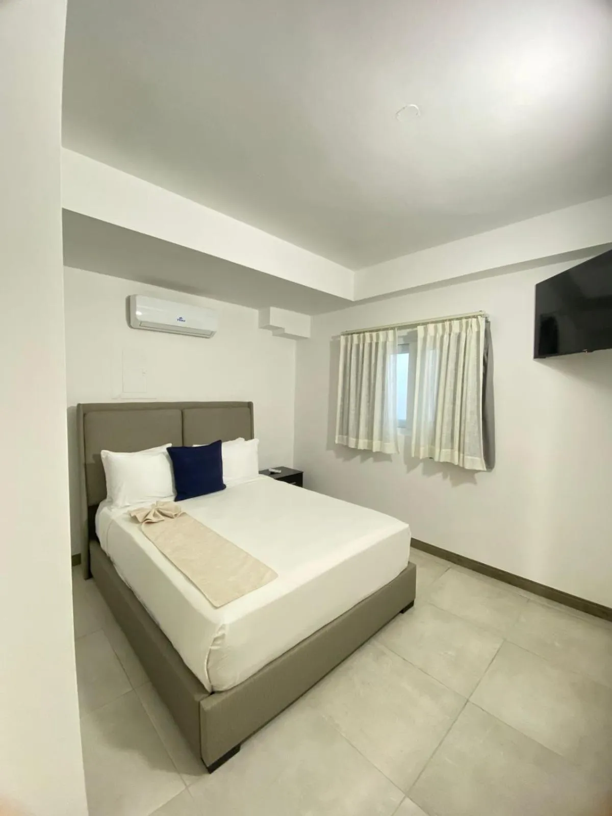 Bed in Green Coast Beach Hotel