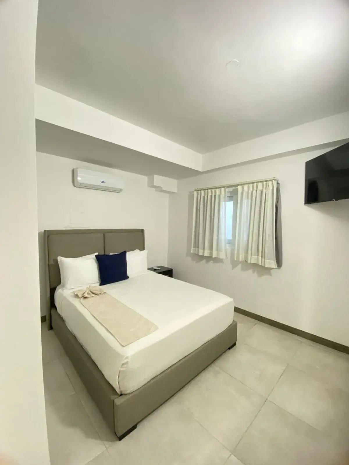 Deluxe Room in Hotel Checkin El Cortecito Beach Deluxe Room in Hotel Checkin El Cortecito Beach