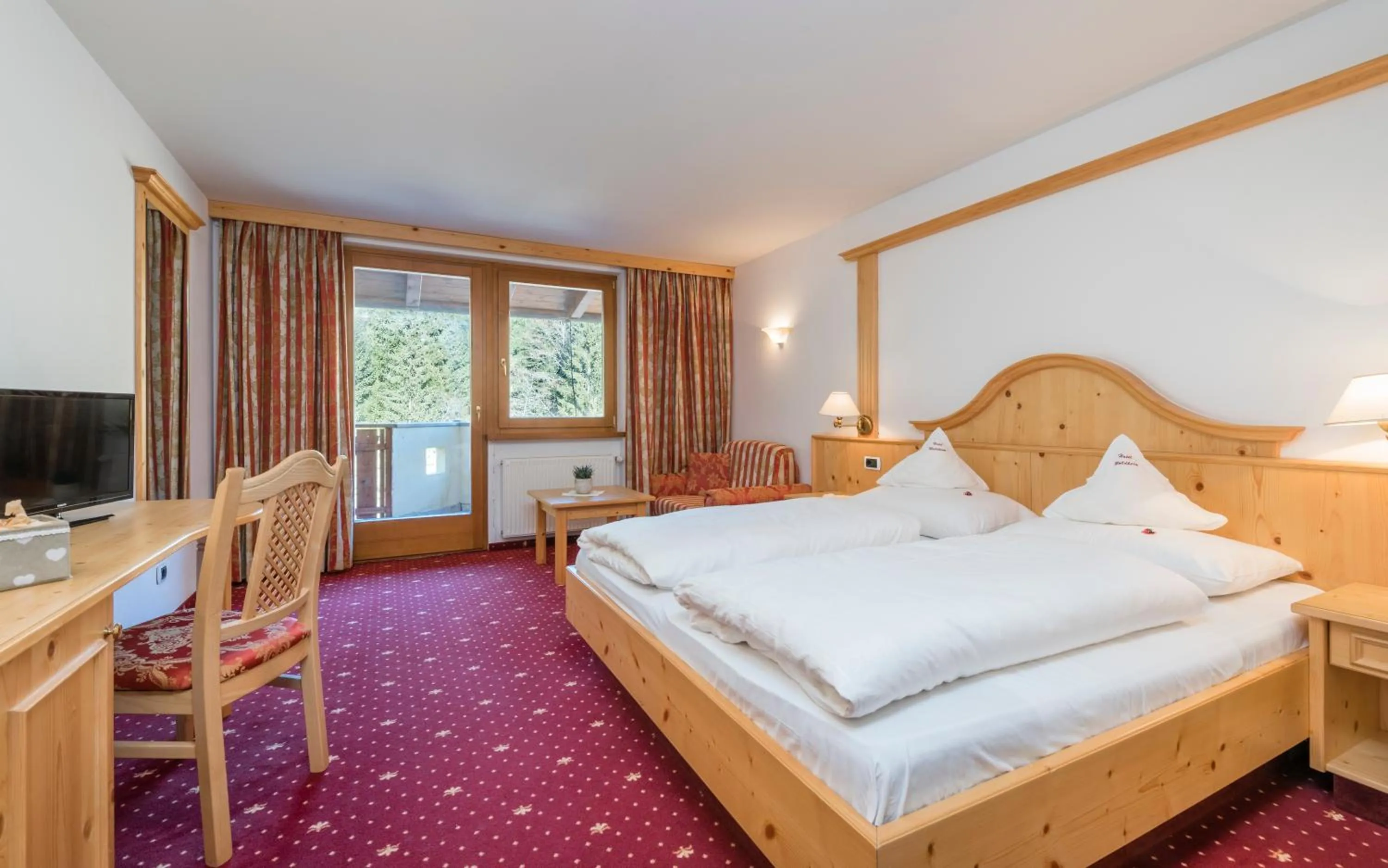 Bed in Naturhotel Waldheim