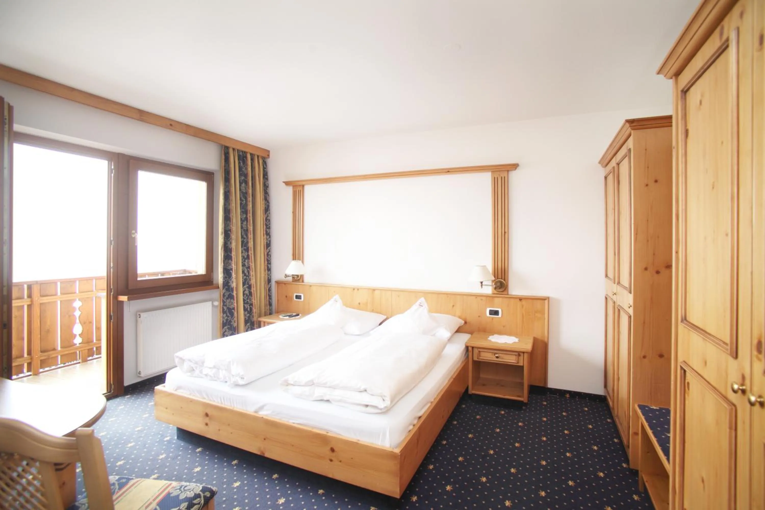 Bed in Naturhotel Waldheim