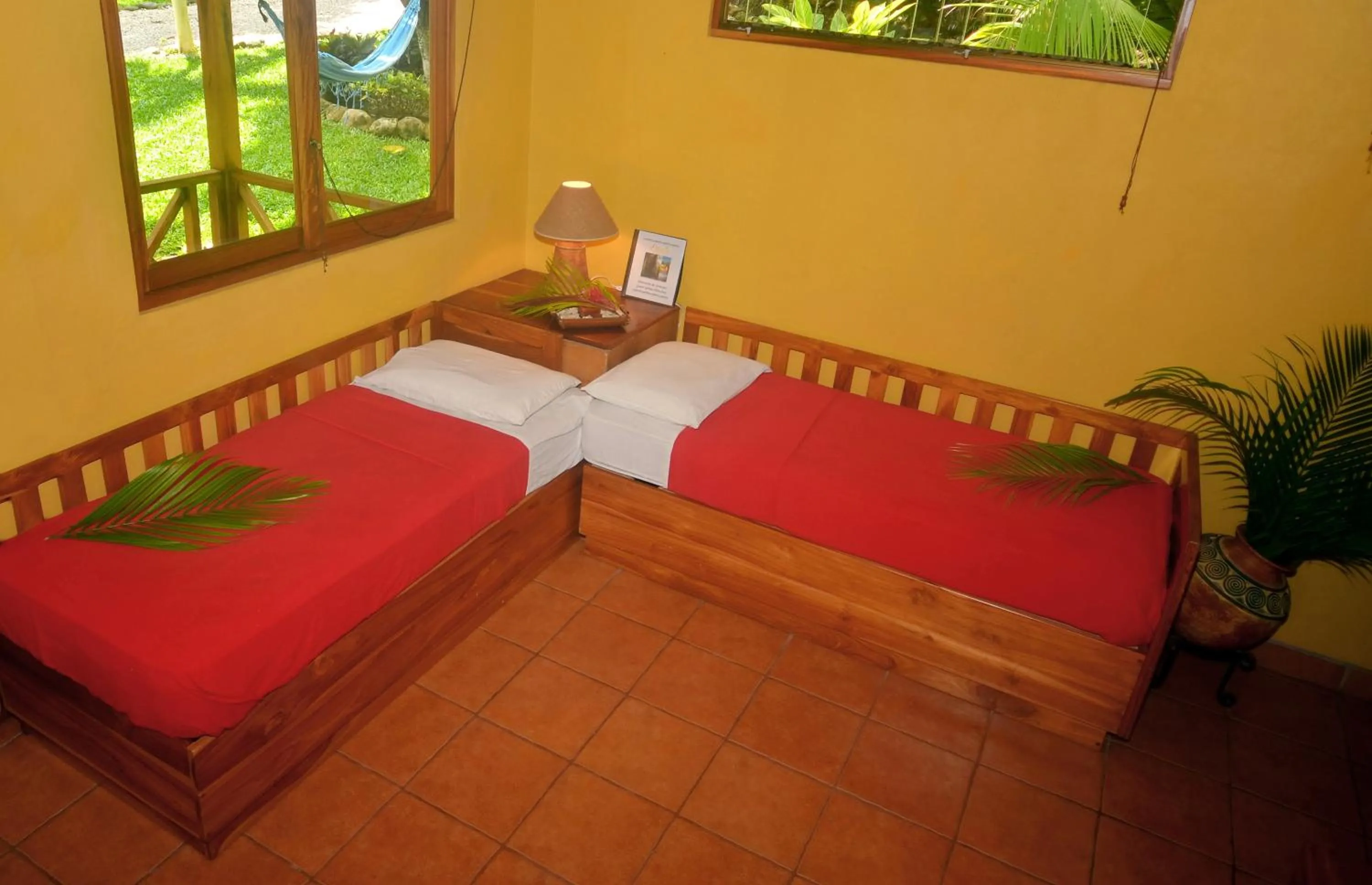 Bed in Esencia Hotel and Villas