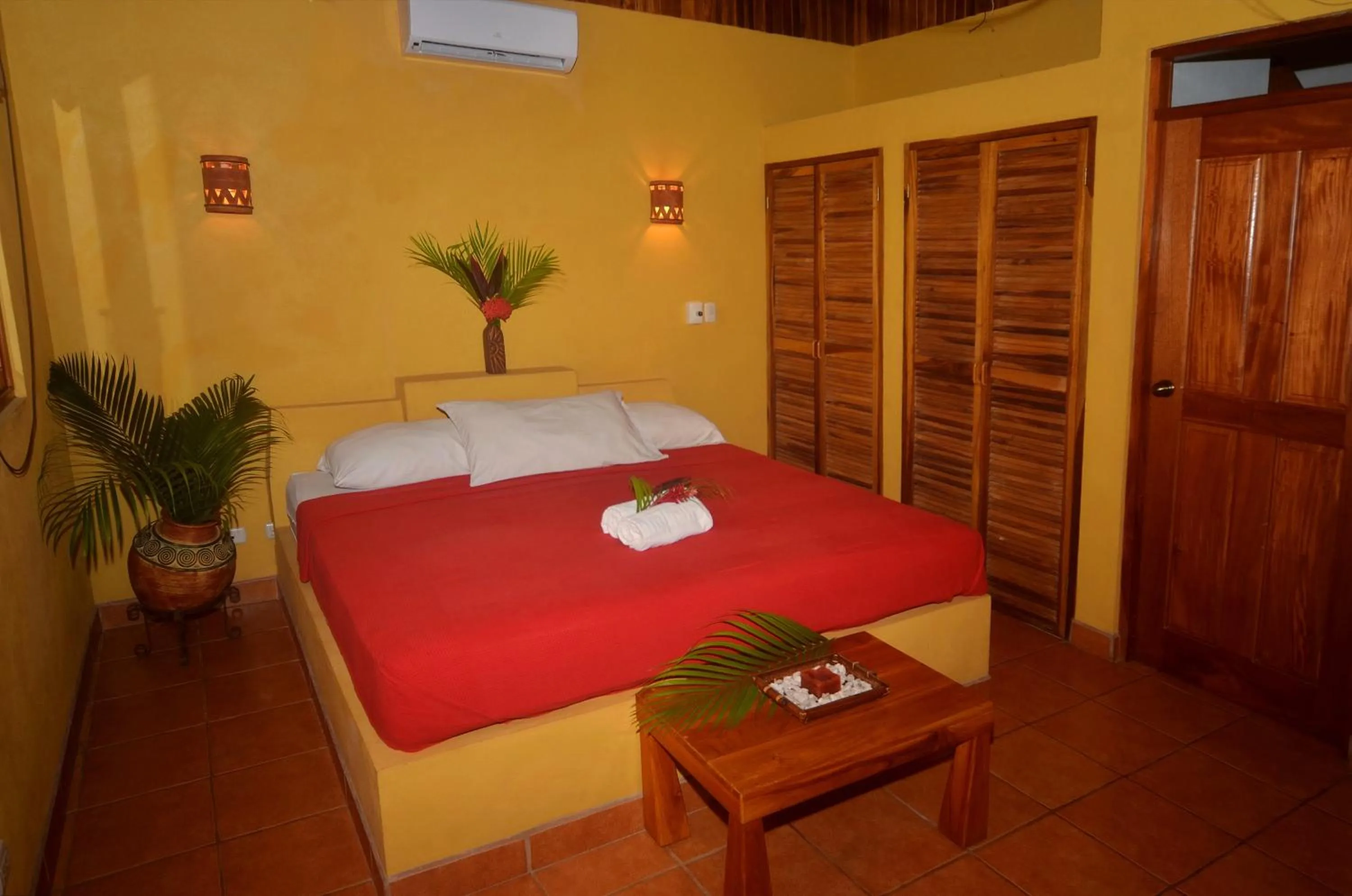 Bed in Esencia Hotel and Villas