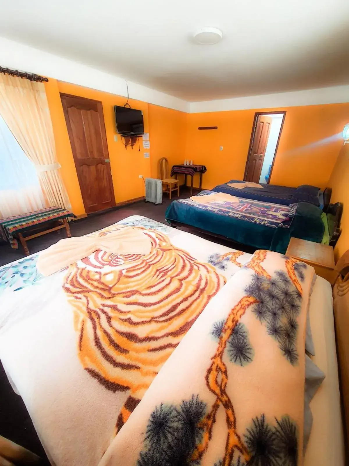 Quadruple Room with Garden View in Hotel Utama Quadruple Room with Garden View in Hotel Utama