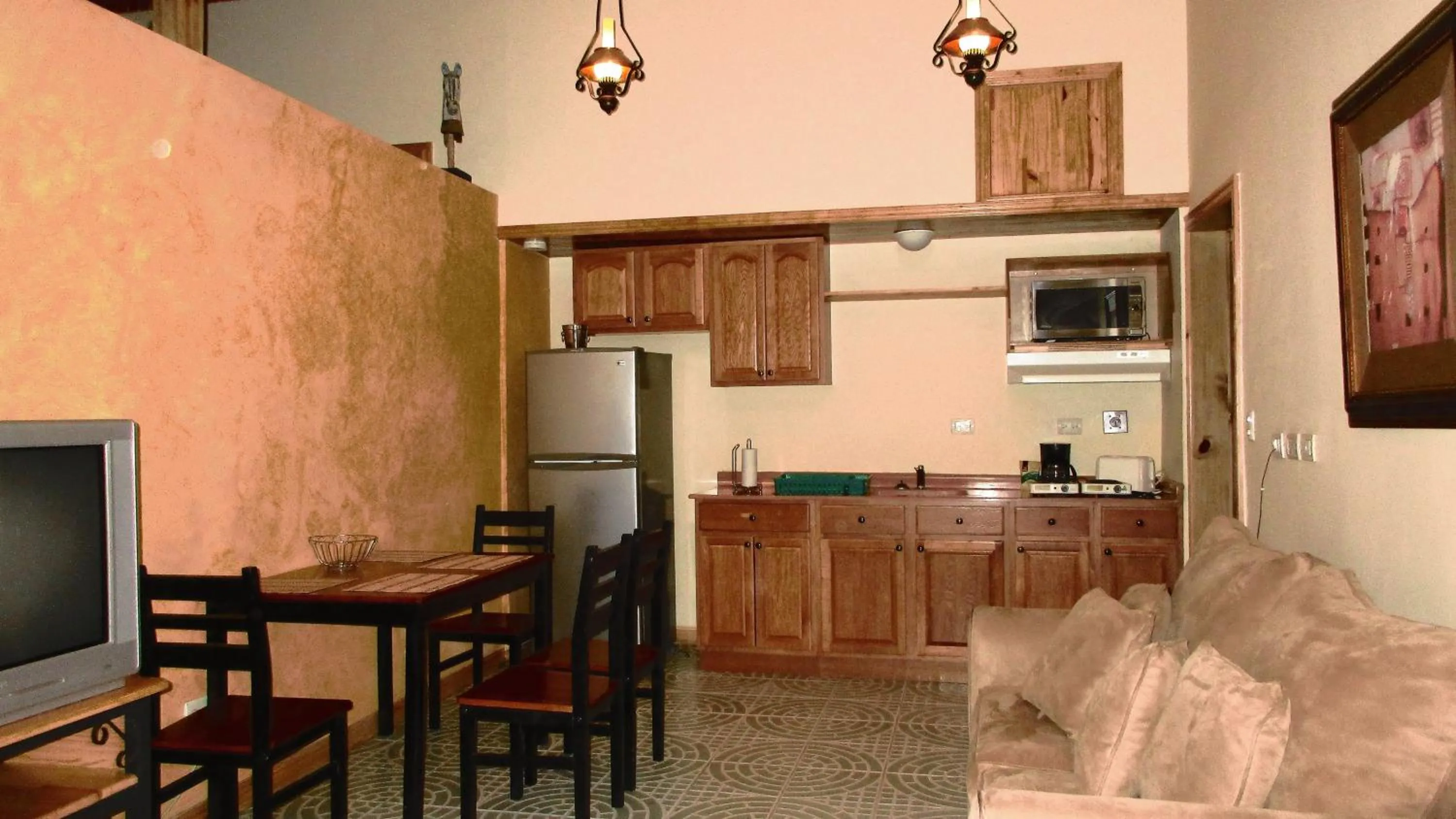 Kitchen or kitchenette in Apartotel Don Francisco