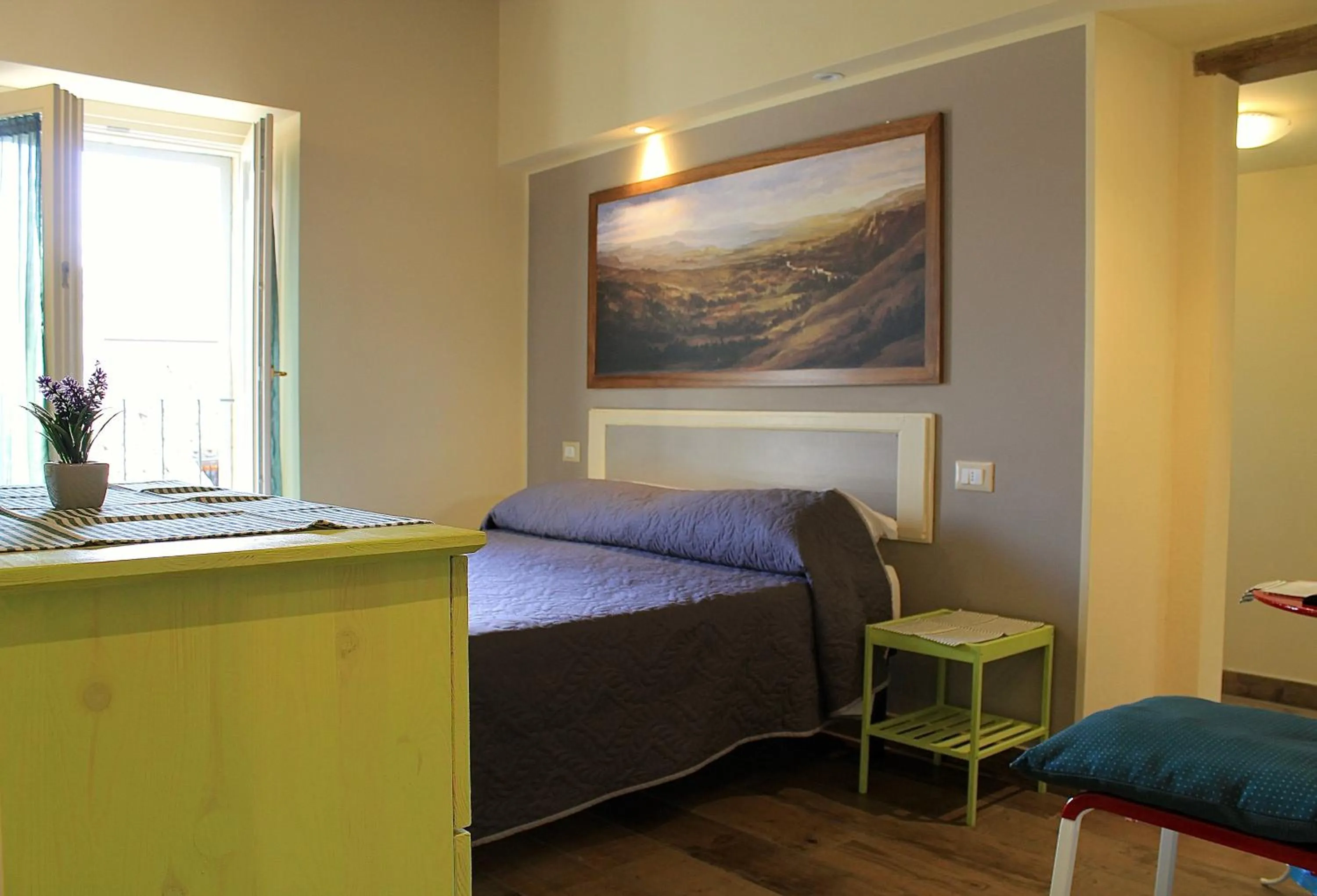 Bed in Alter Ego b&b Assisi