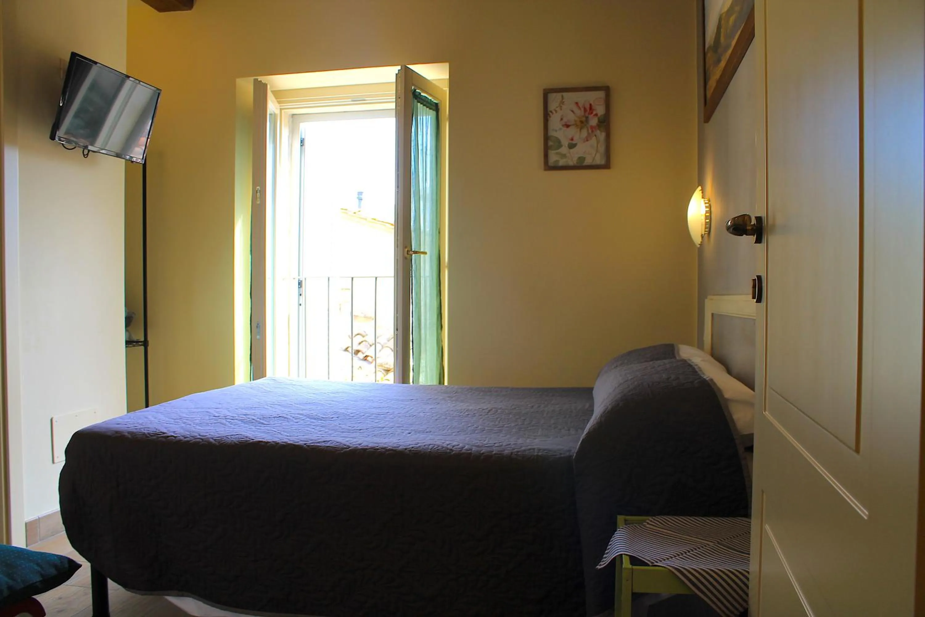 Bed in Alter Ego b&b Assisi