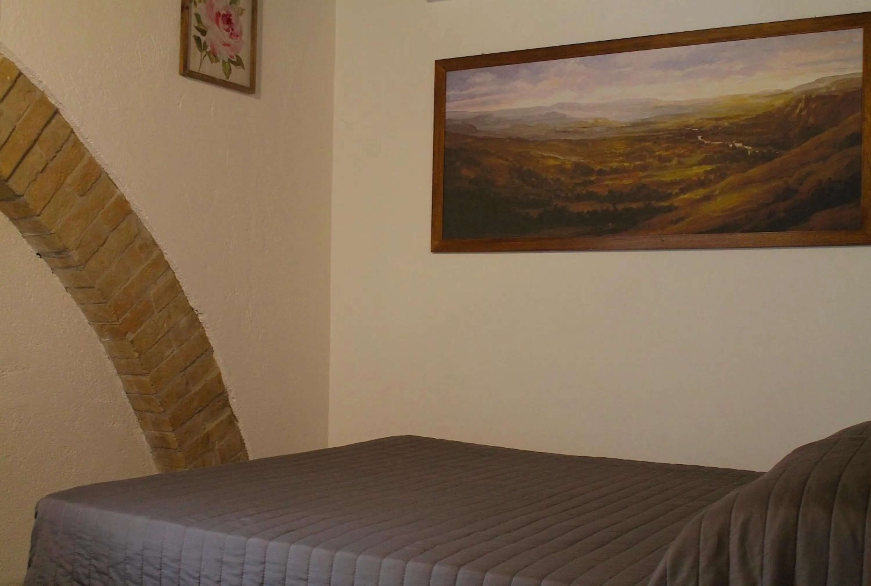 Bed in Alter Ego b&b Assisi