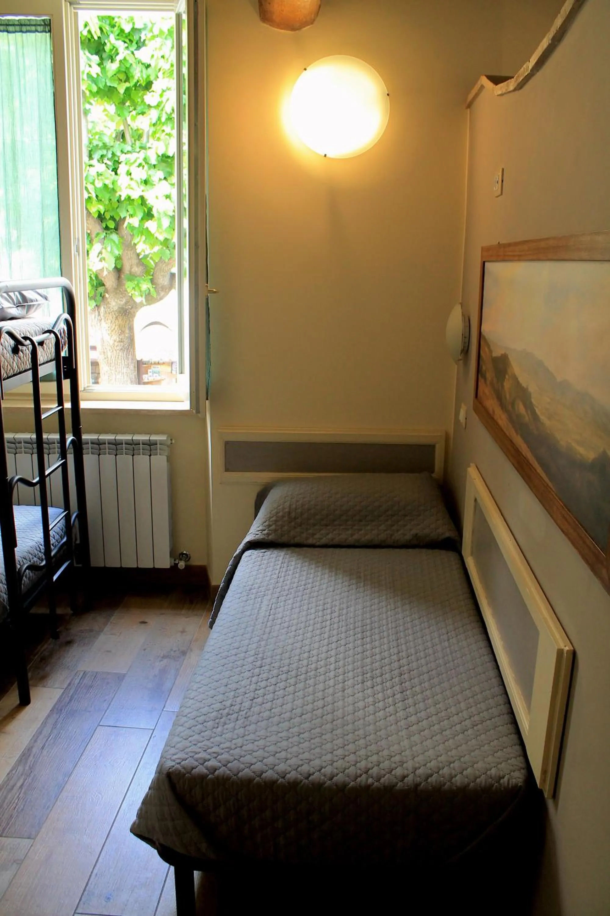 Bed in Alter Ego b&b Assisi