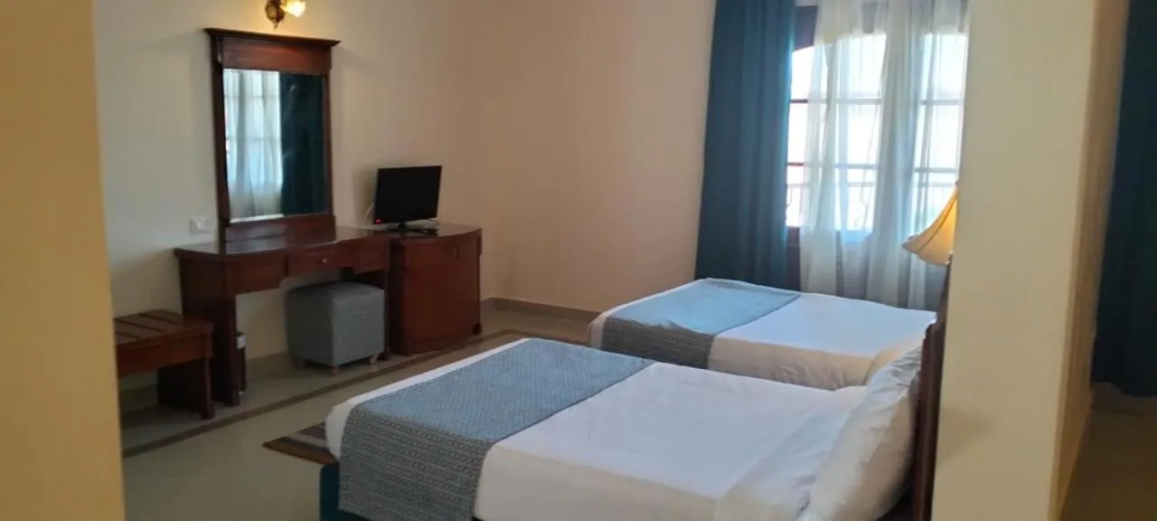 Bed in Coral Hills Resort & SPA