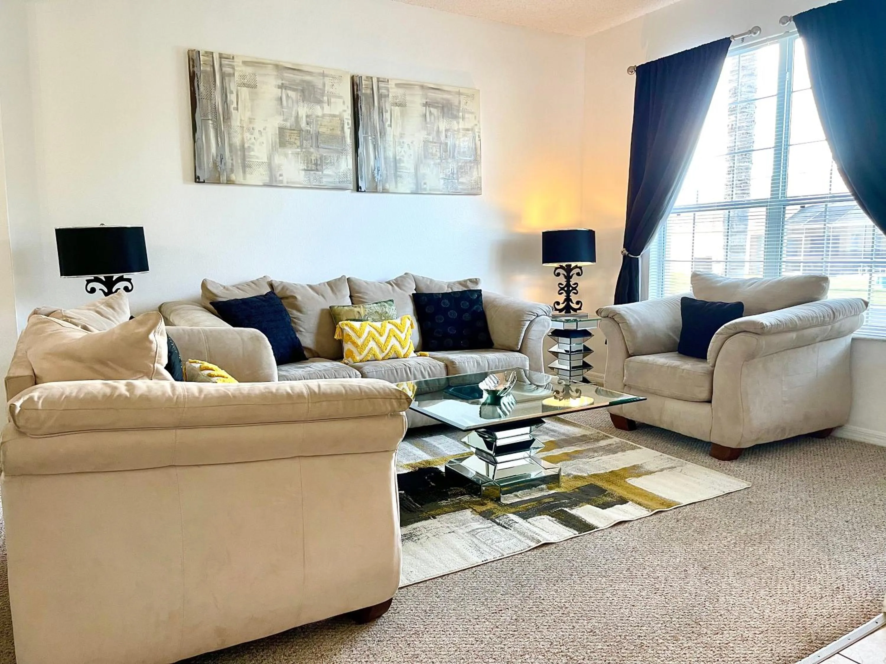 Living room in Disney Dream with Hot Tub, Pool, Xbox, Games Room, Lakeview, 10 min to Disney, Clubhouse