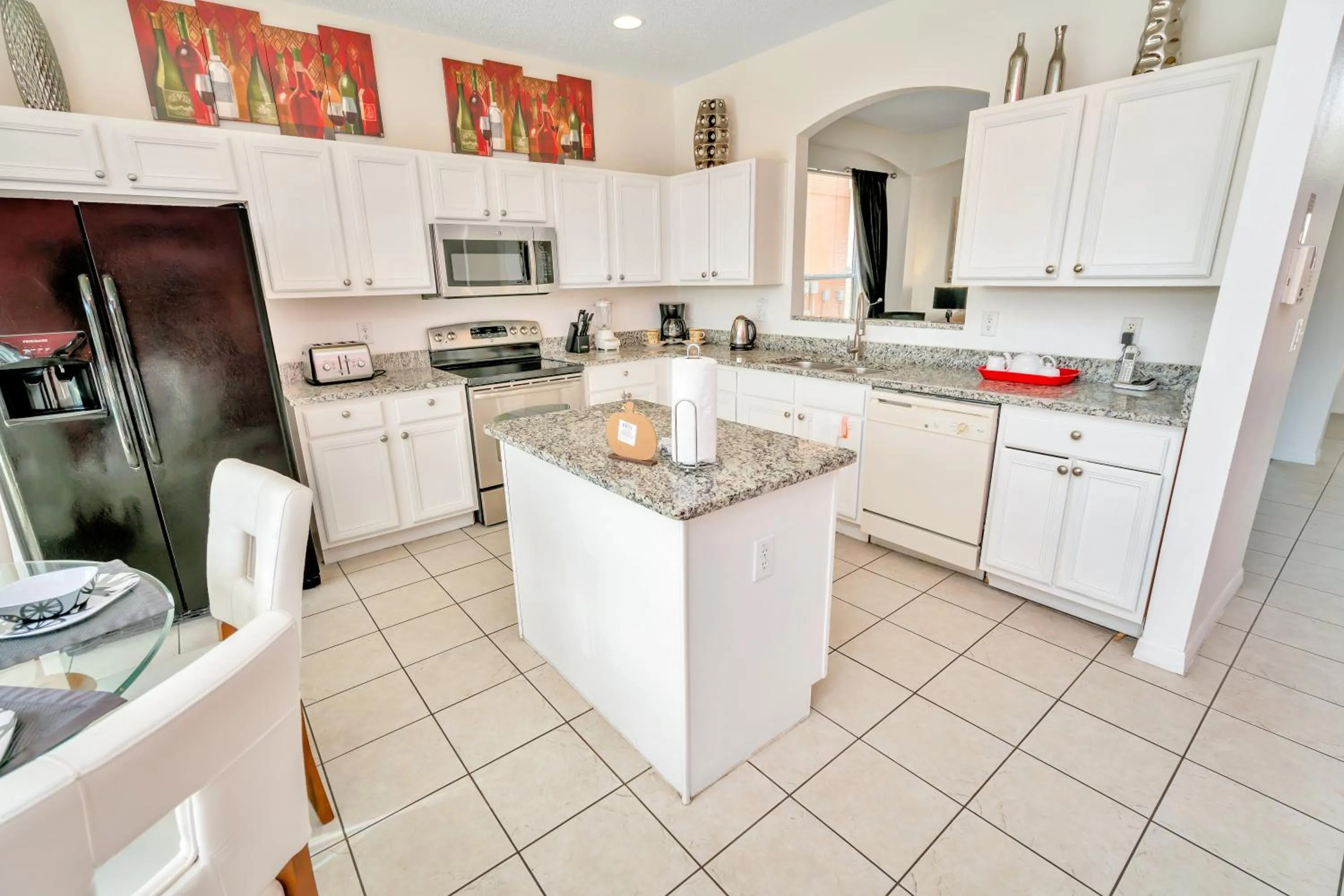 Kitchen or kitchenette in Disney Dream with Hot Tub, Pool, Xbox, Games Room, Lakeview, 10 min to Disney, Clubhouse