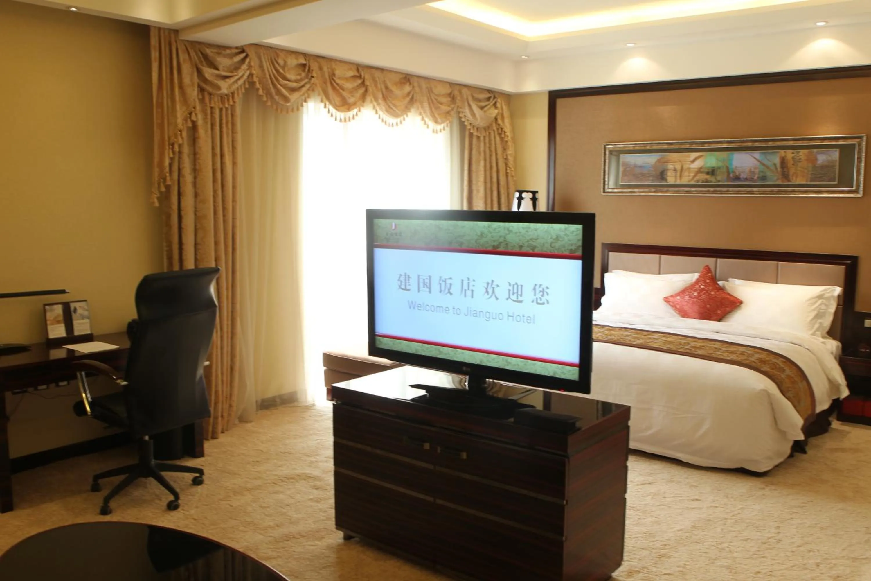 Photo of the whole room, Bed in Zhengzhou Jianguo Hotel
