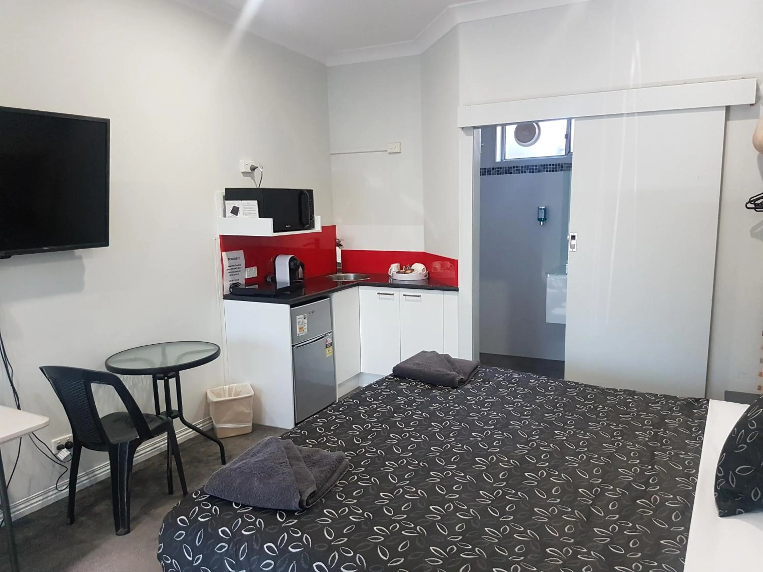 Bed in Motel24Seven and Apartments