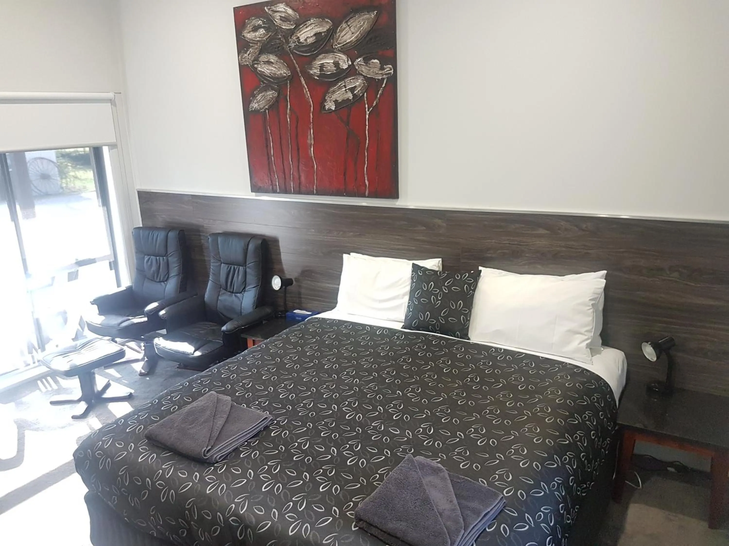 Bed in Motel24Seven and Apartments