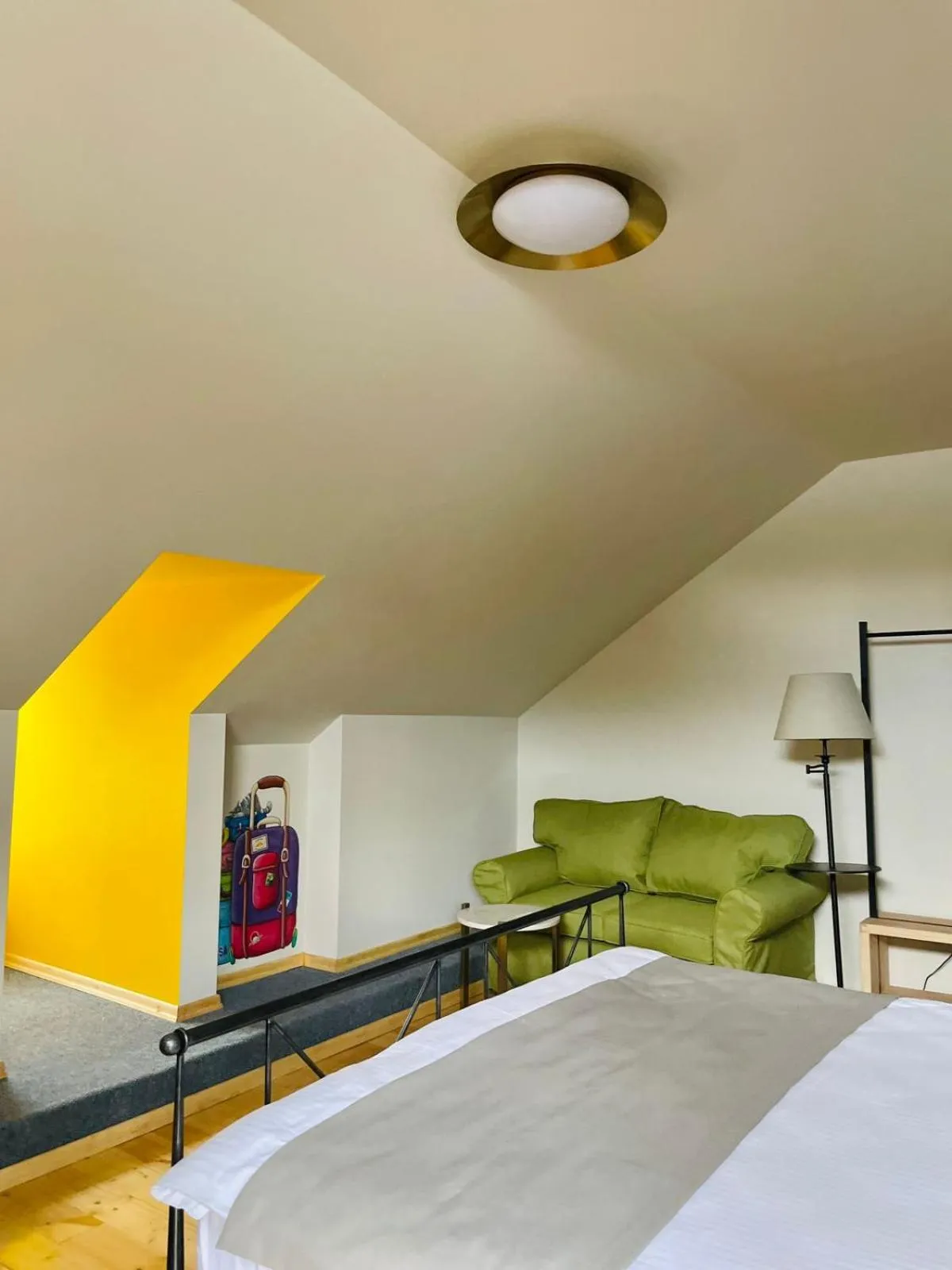 Seating area, Bed in Artisan Boutique Hotel & Gallery