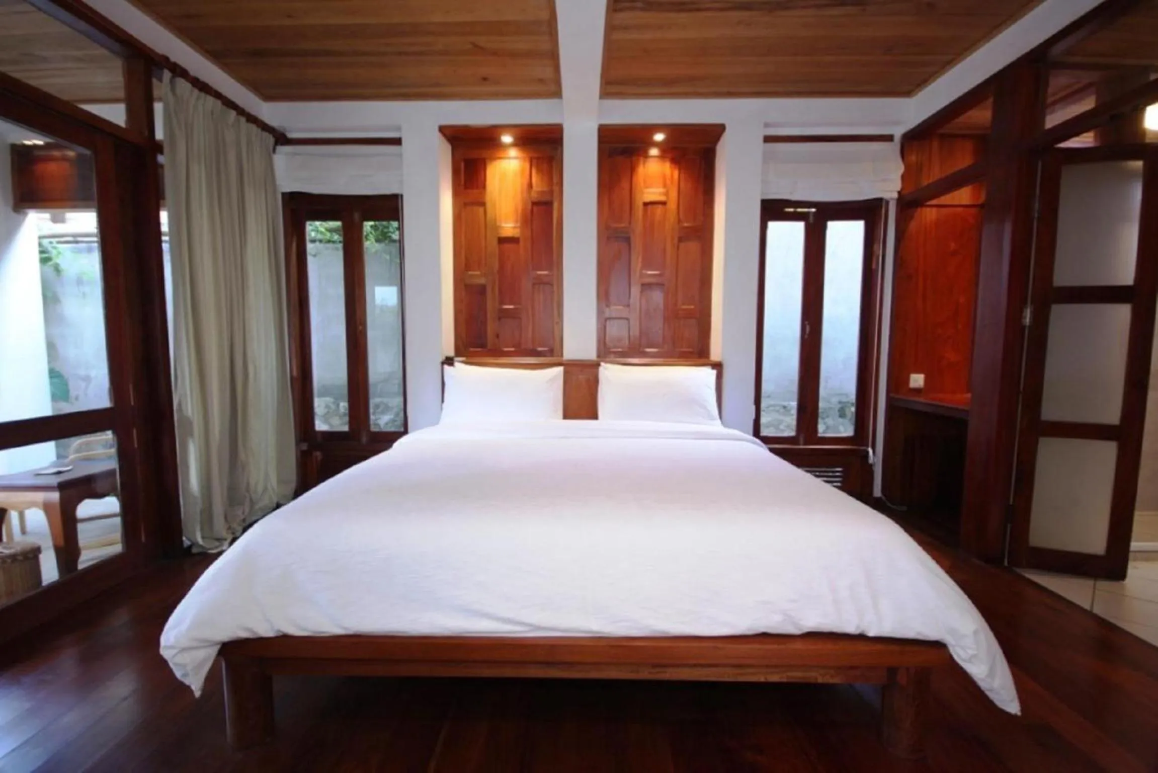 Bed in Sala Prabang Hotel