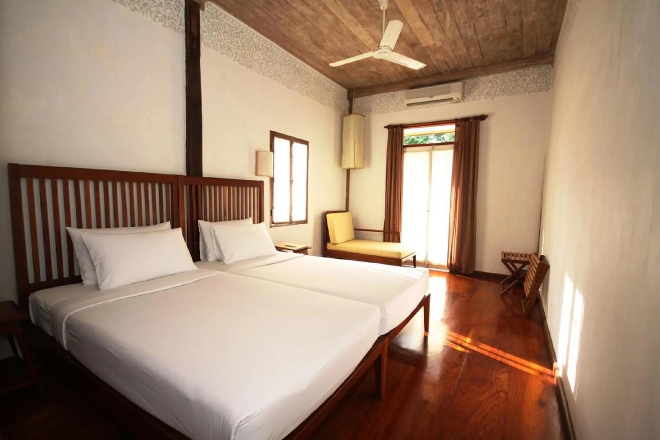 Bed in Sala Prabang Hotel