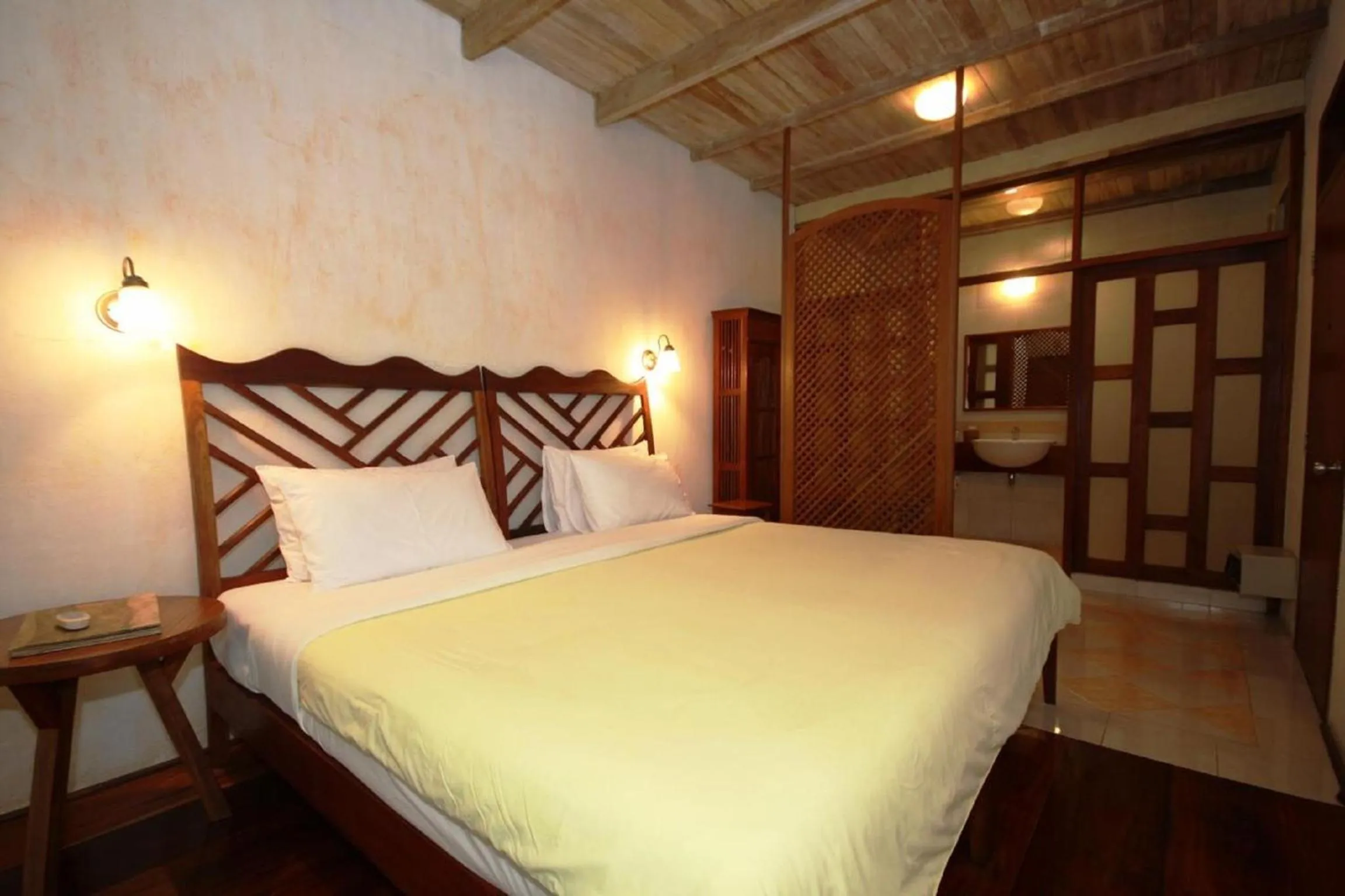 Bed in Sala Prabang Hotel