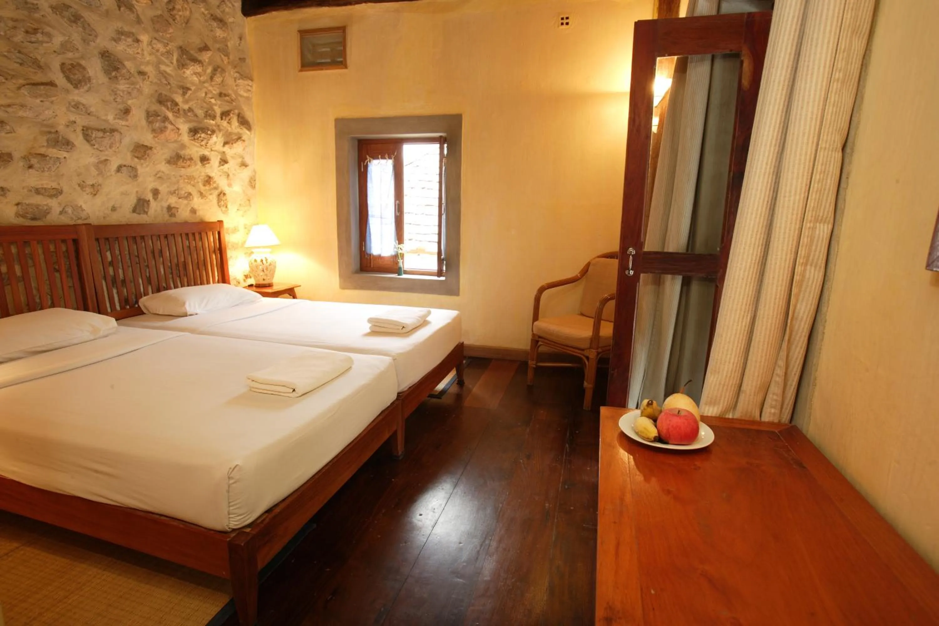 Bed in Sala Prabang Hotel