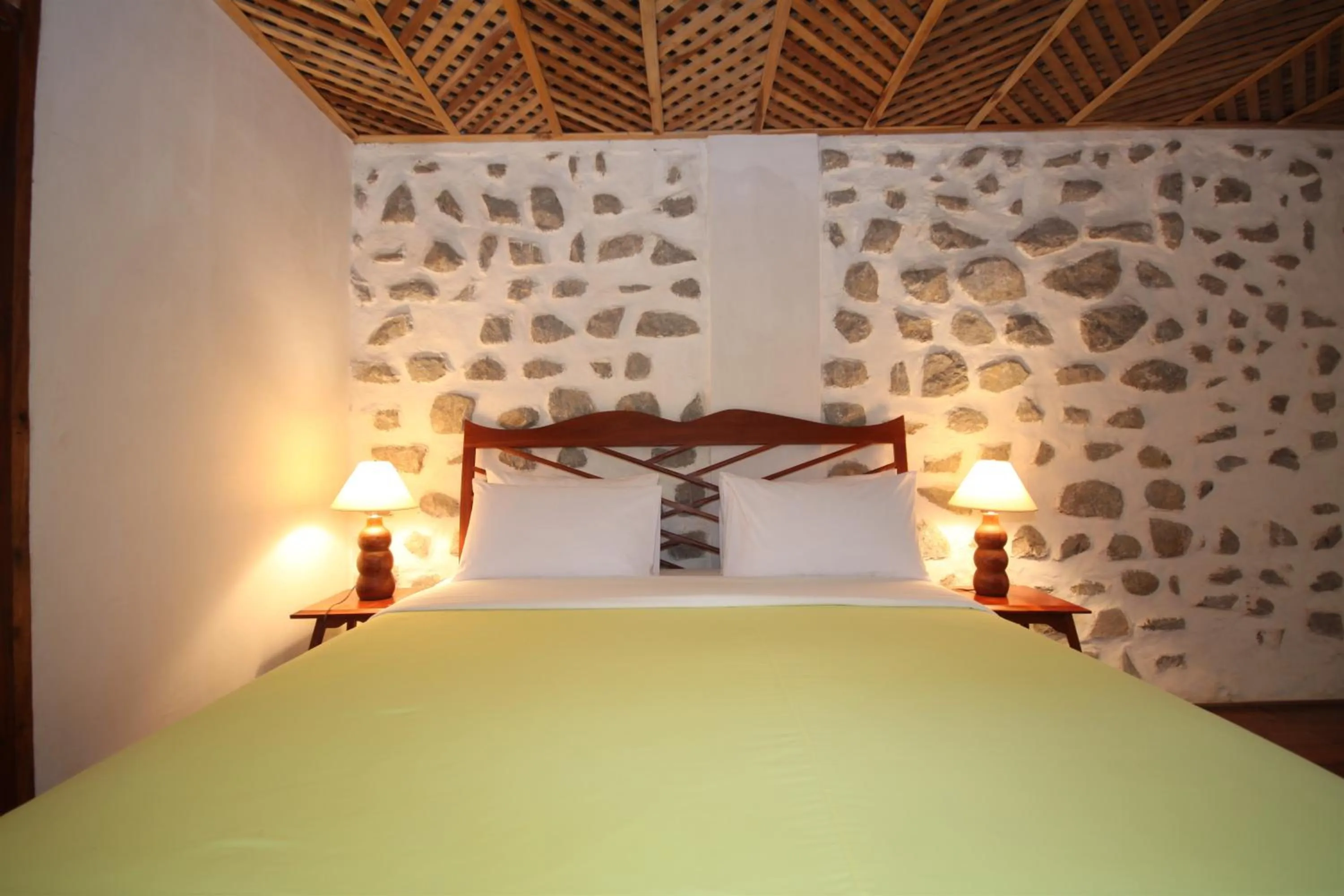 Bed in Sala Prabang Hotel