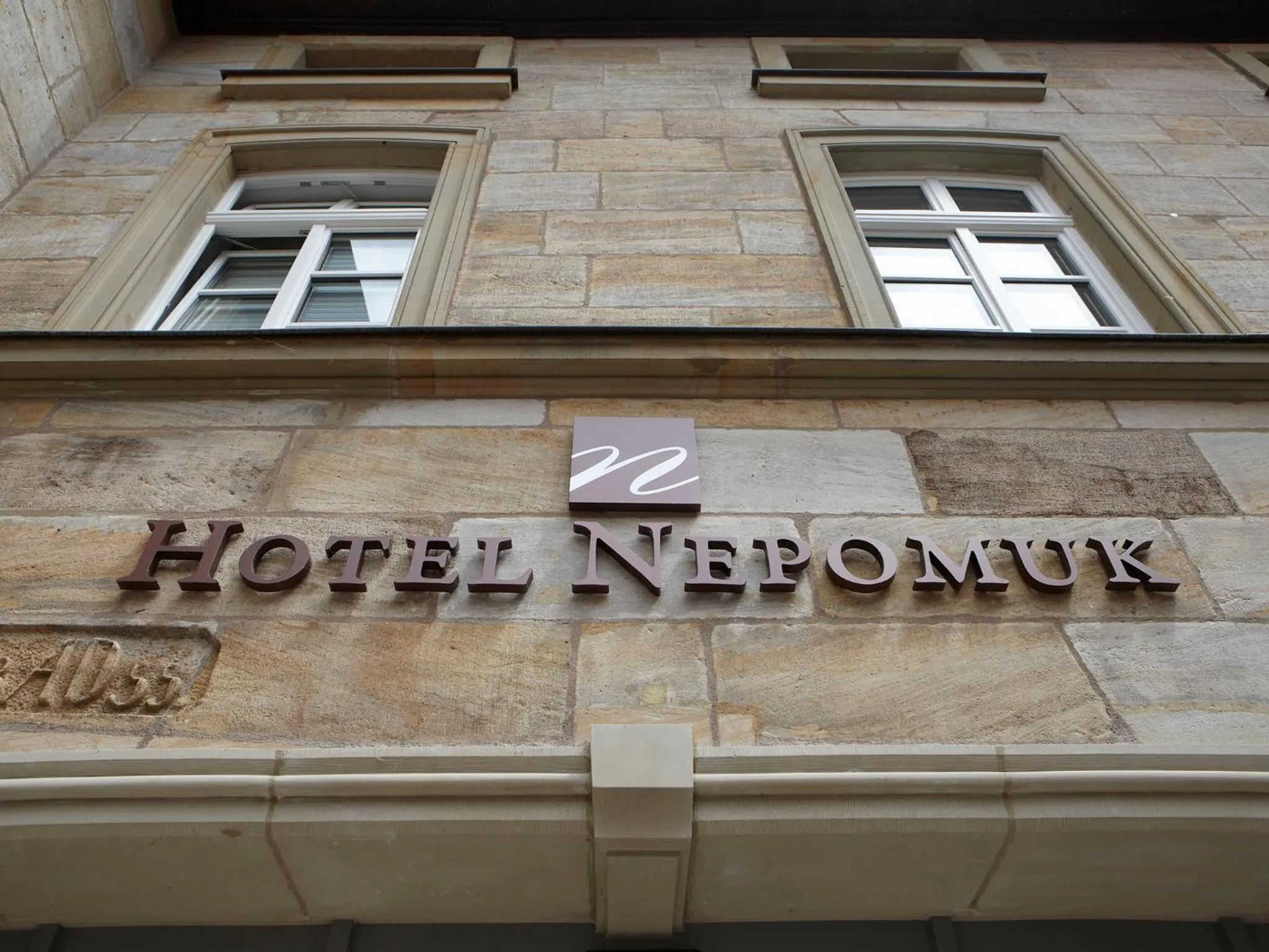 Property logo or sign in Hotel Nepomuk