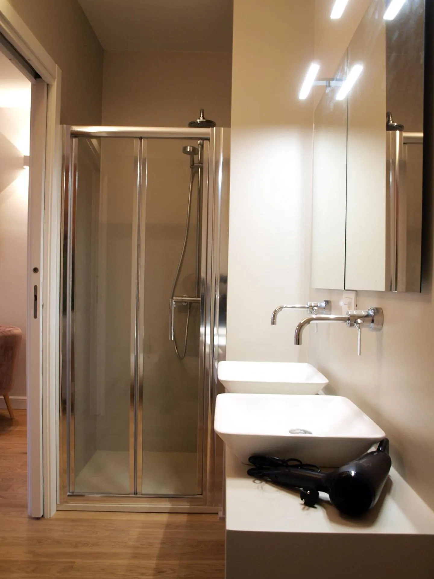 Shower in Cosmopolitan Central Rooms