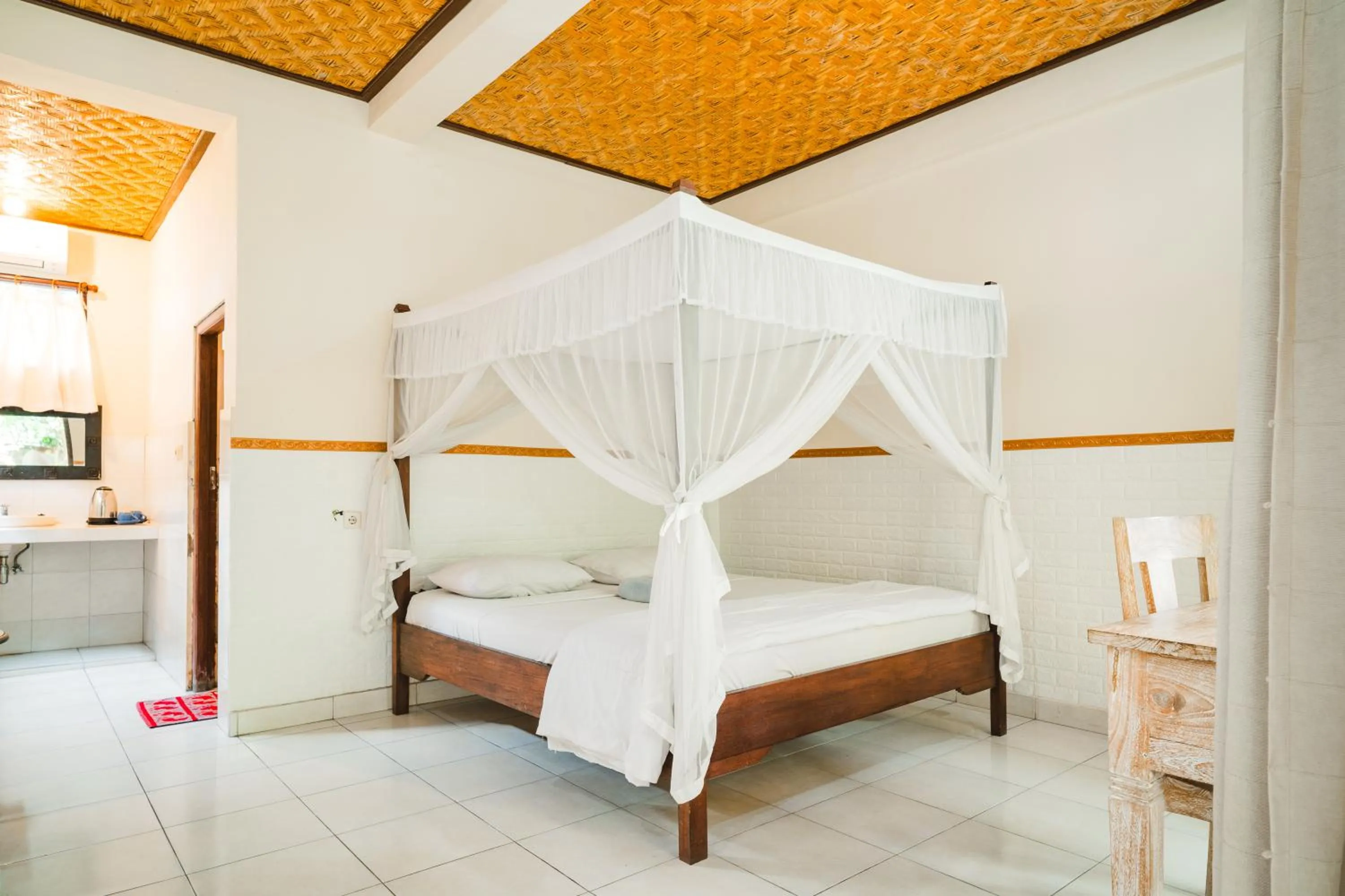 Bed in Bismajaya Bungalow