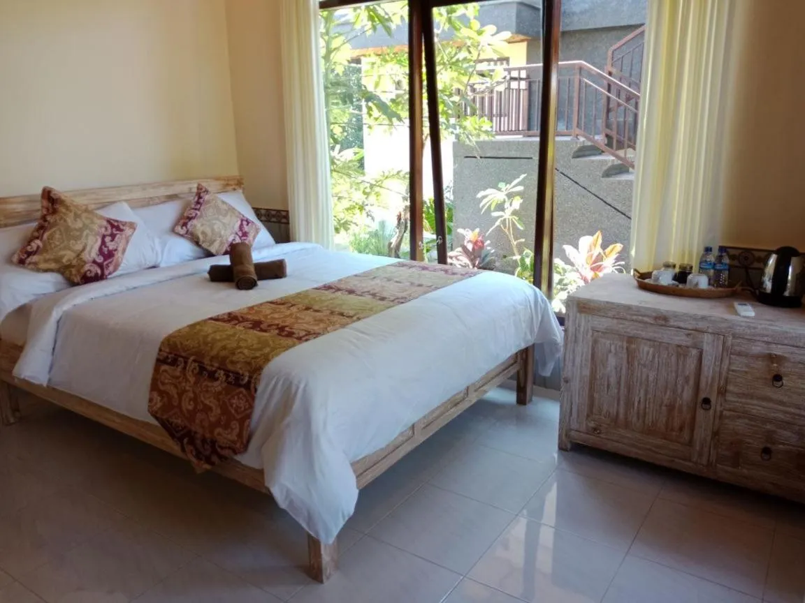 Bed in Bismajaya Bungalow