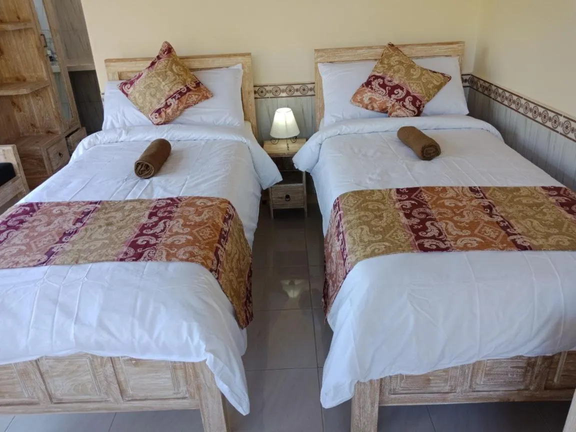 Bed in Bismajaya Bungalow