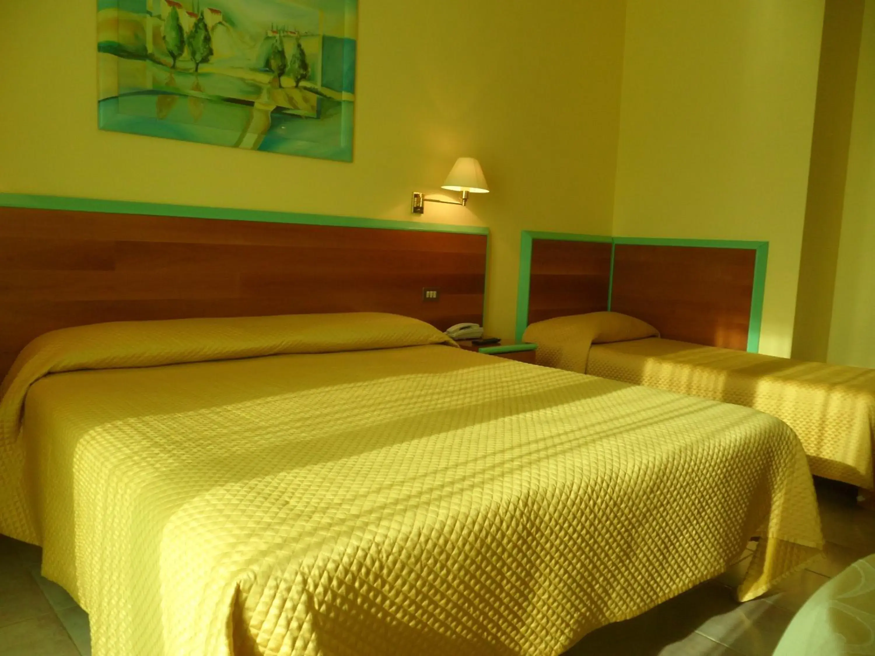 Triple Room in Hotel Parco degli Ulivi Triple Room in Hotel Parco degli Ulivi