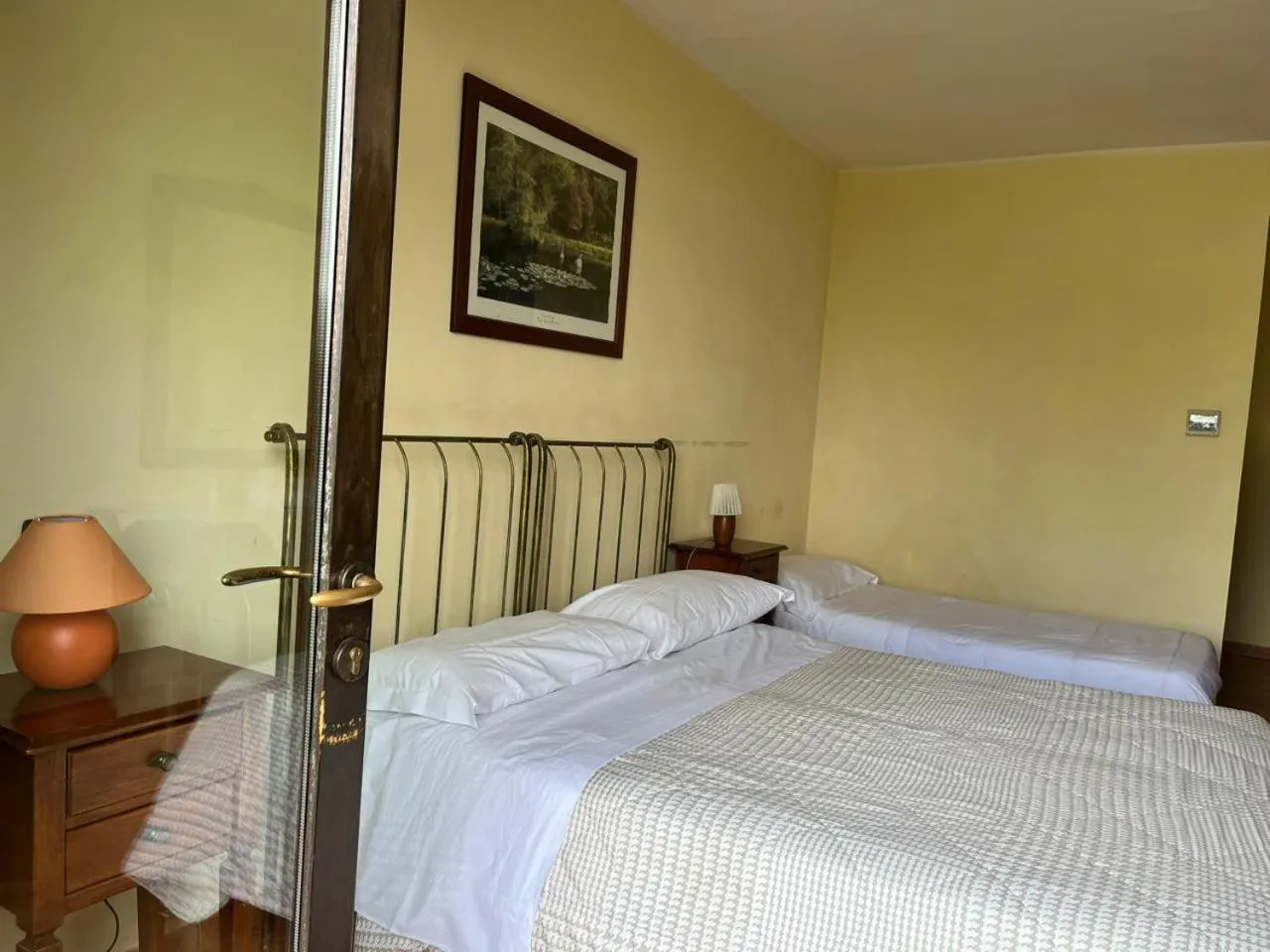 Bed in Albergo Cosmera
