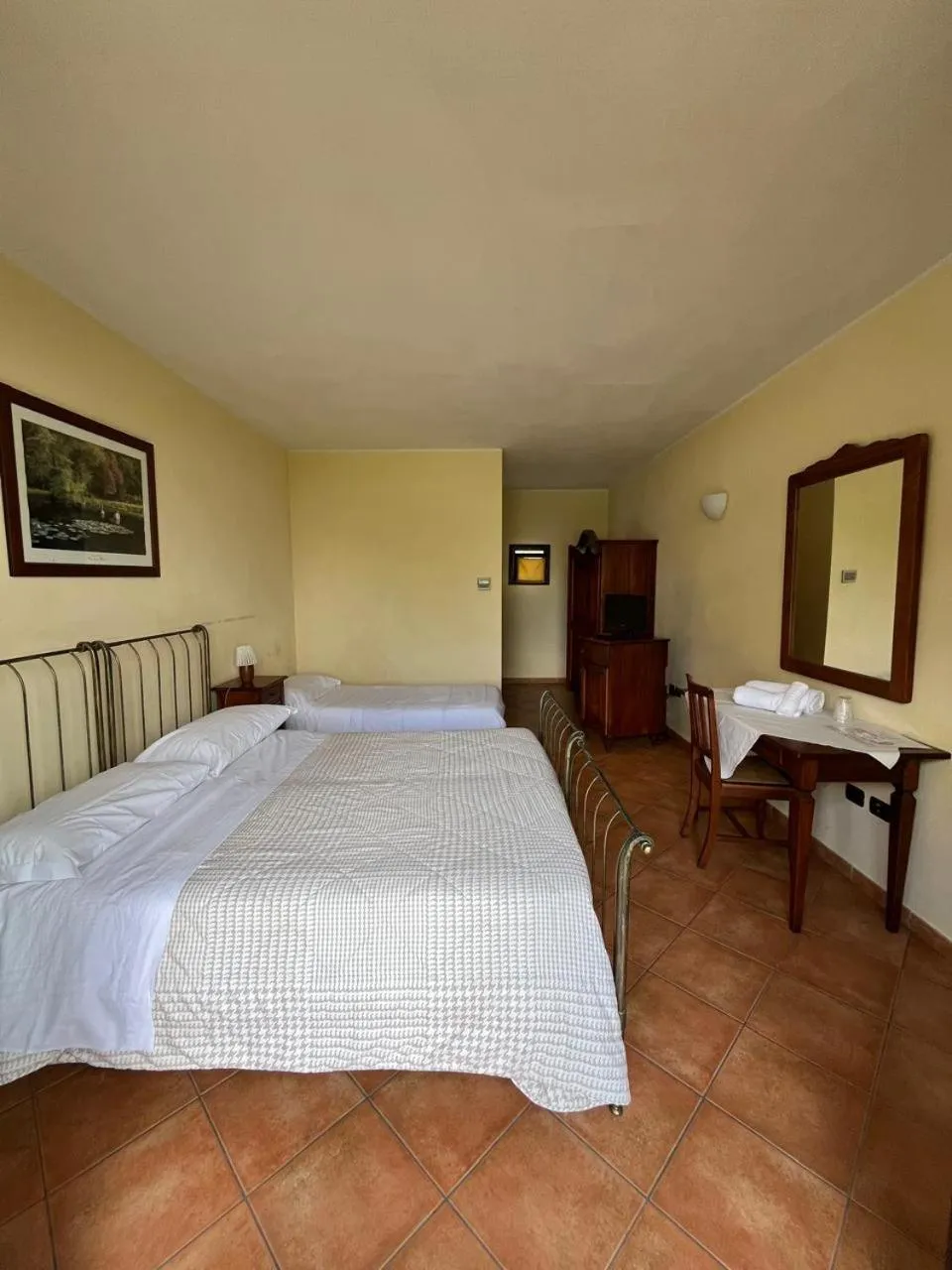 Bed in Albergo Cosmera