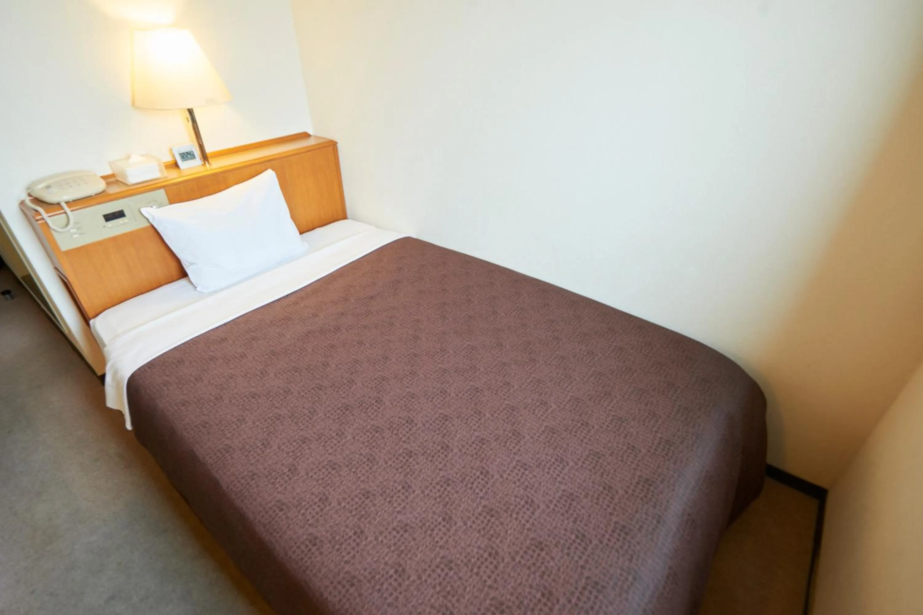 Bed in Hotel Select Inn Hachinohe Chuo