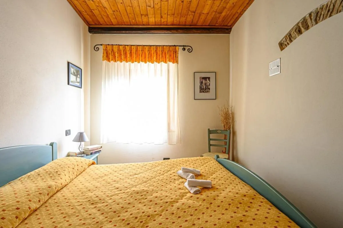 Bed in Agriturismo Pian di Fiume