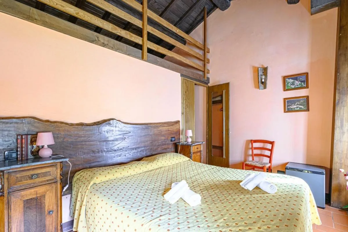 Bed in Agriturismo Pian di Fiume