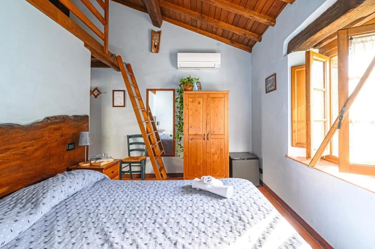 Bed in Agriturismo Pian di Fiume