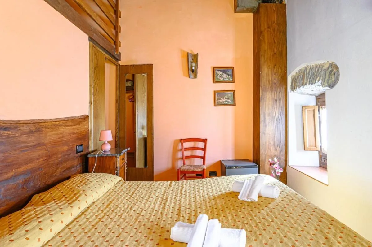 Bed in Agriturismo Pian di Fiume