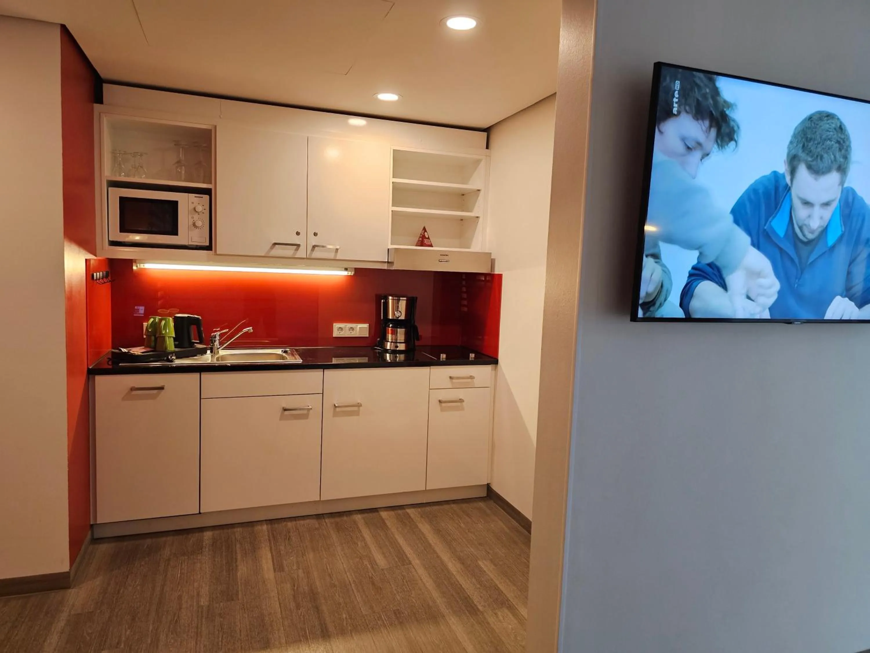 Kitchen or kitchenette in Hotel Am Kaisersaal