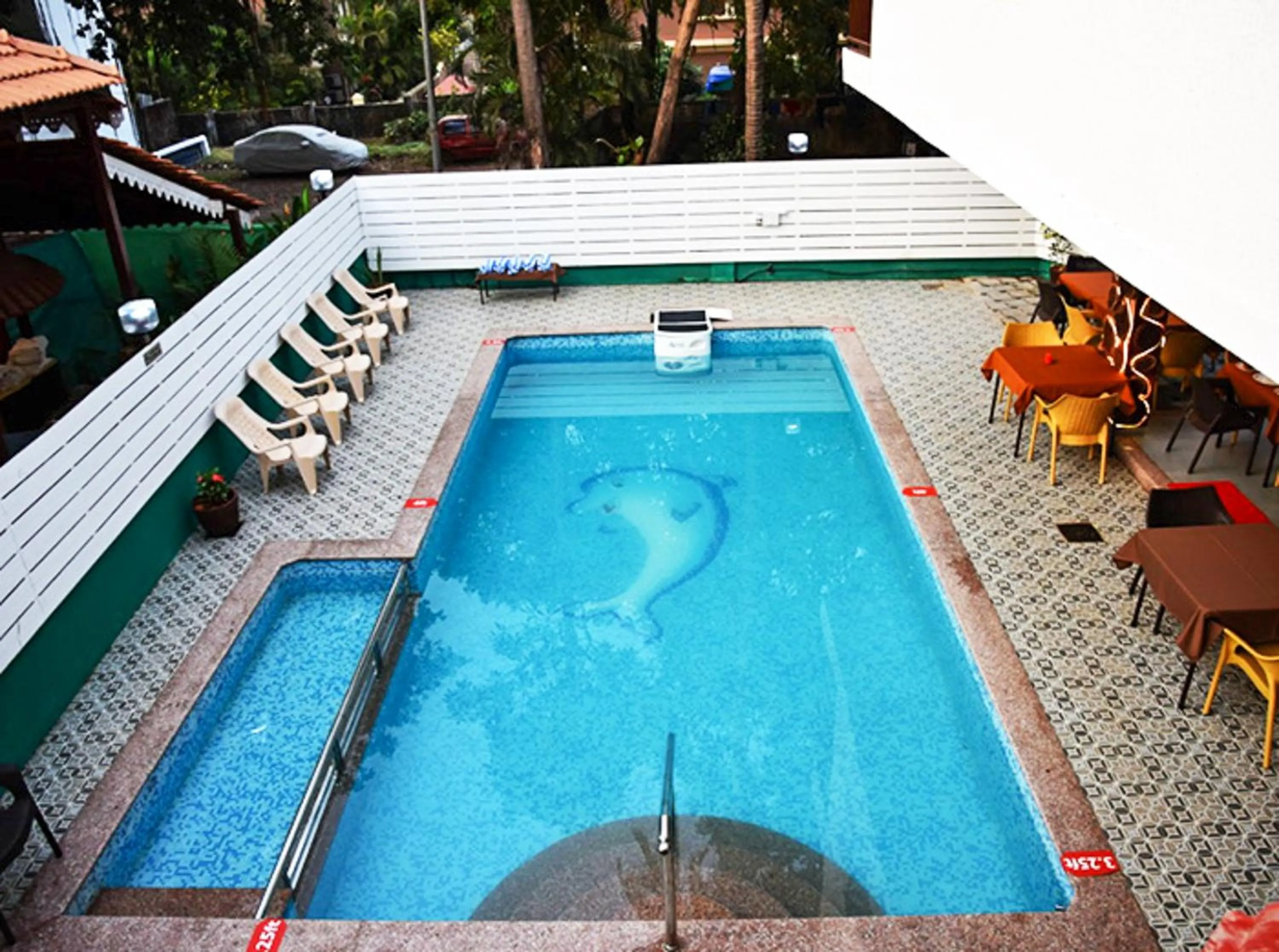 Swimming pool in De Falcon Goa Beach Resort