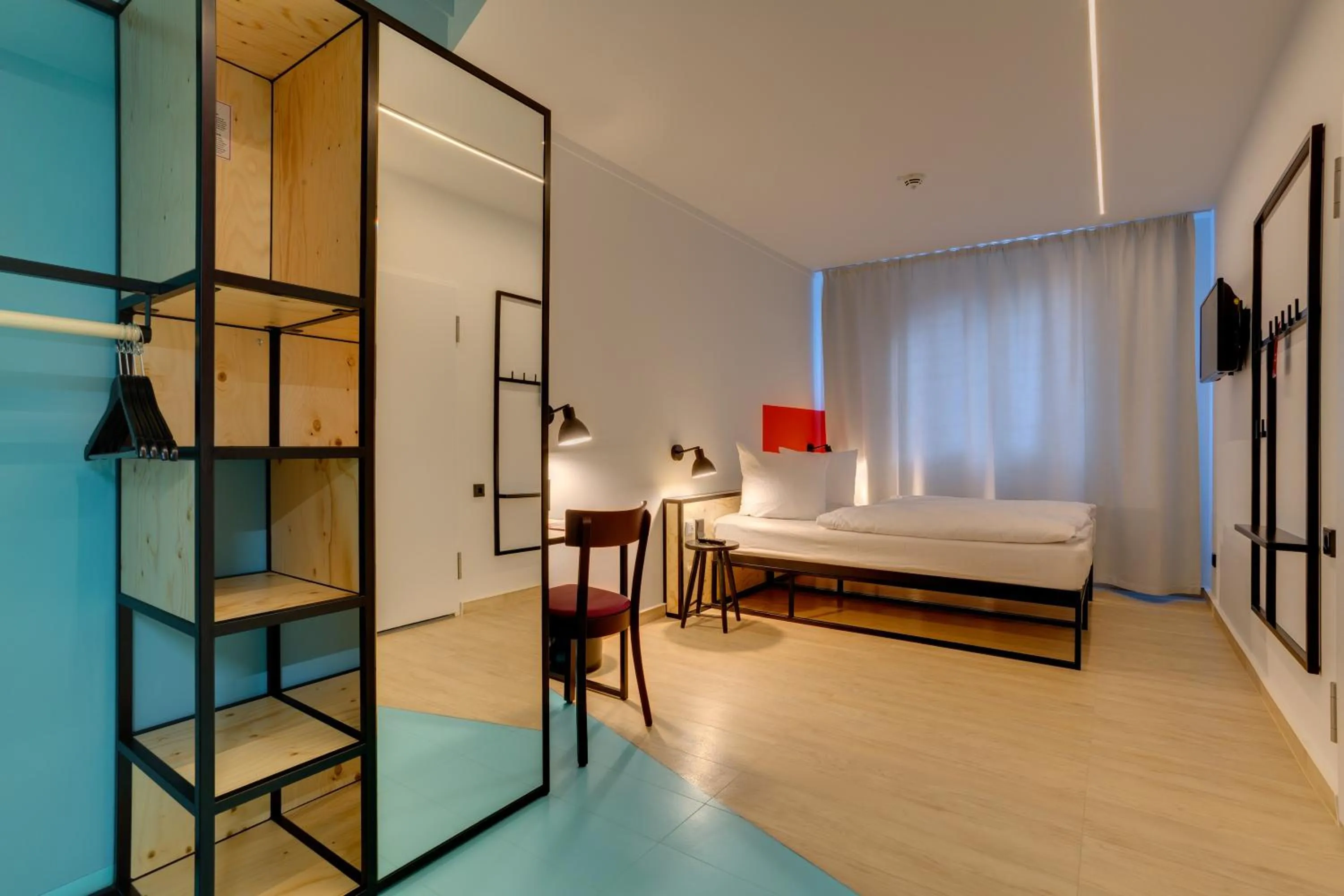 Photo of the whole room, Bed in MEININGER Hotel Leipzig Hauptbahnhof