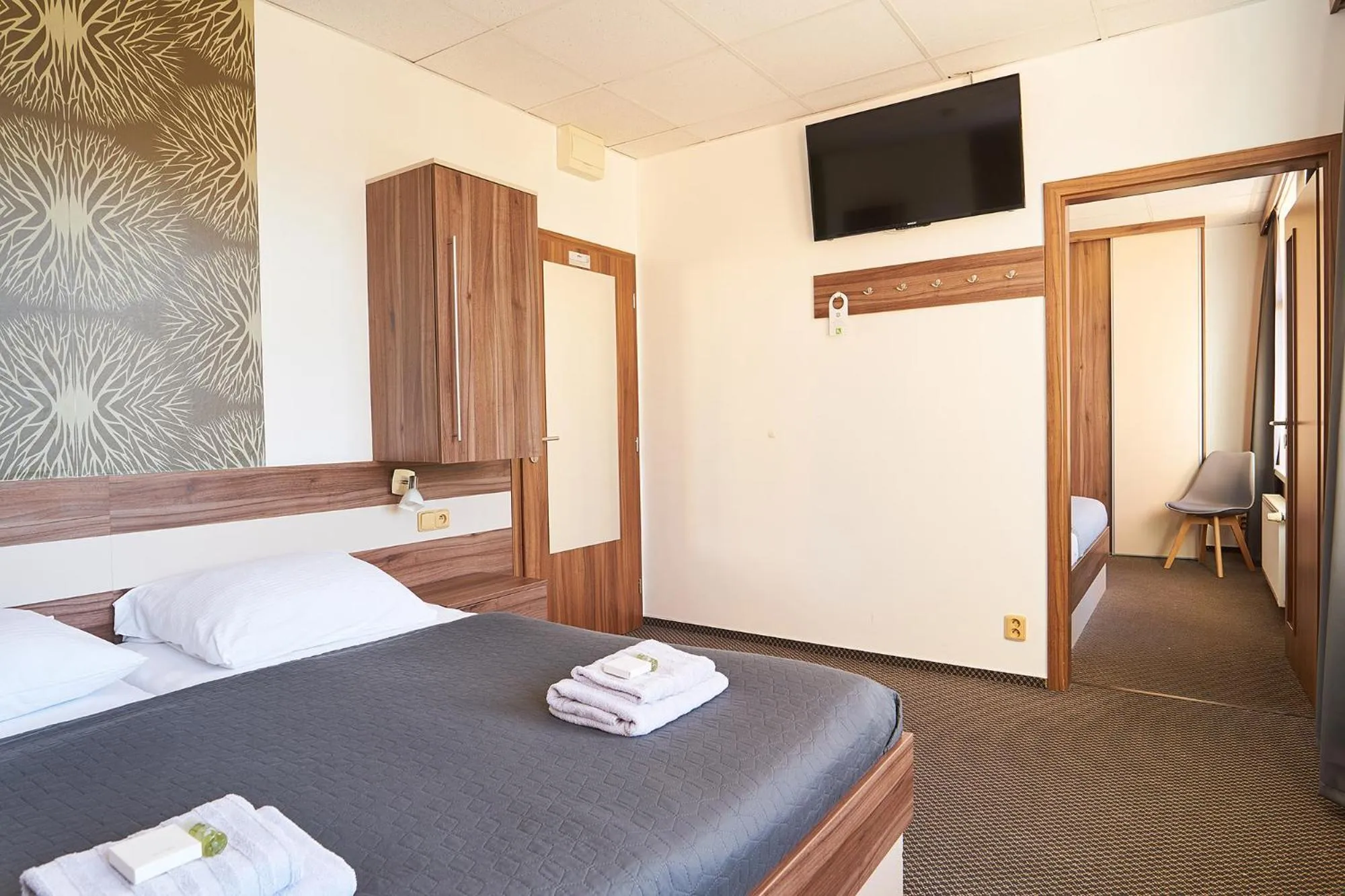 Property building, Bed in Wellness Hotel Kocanda