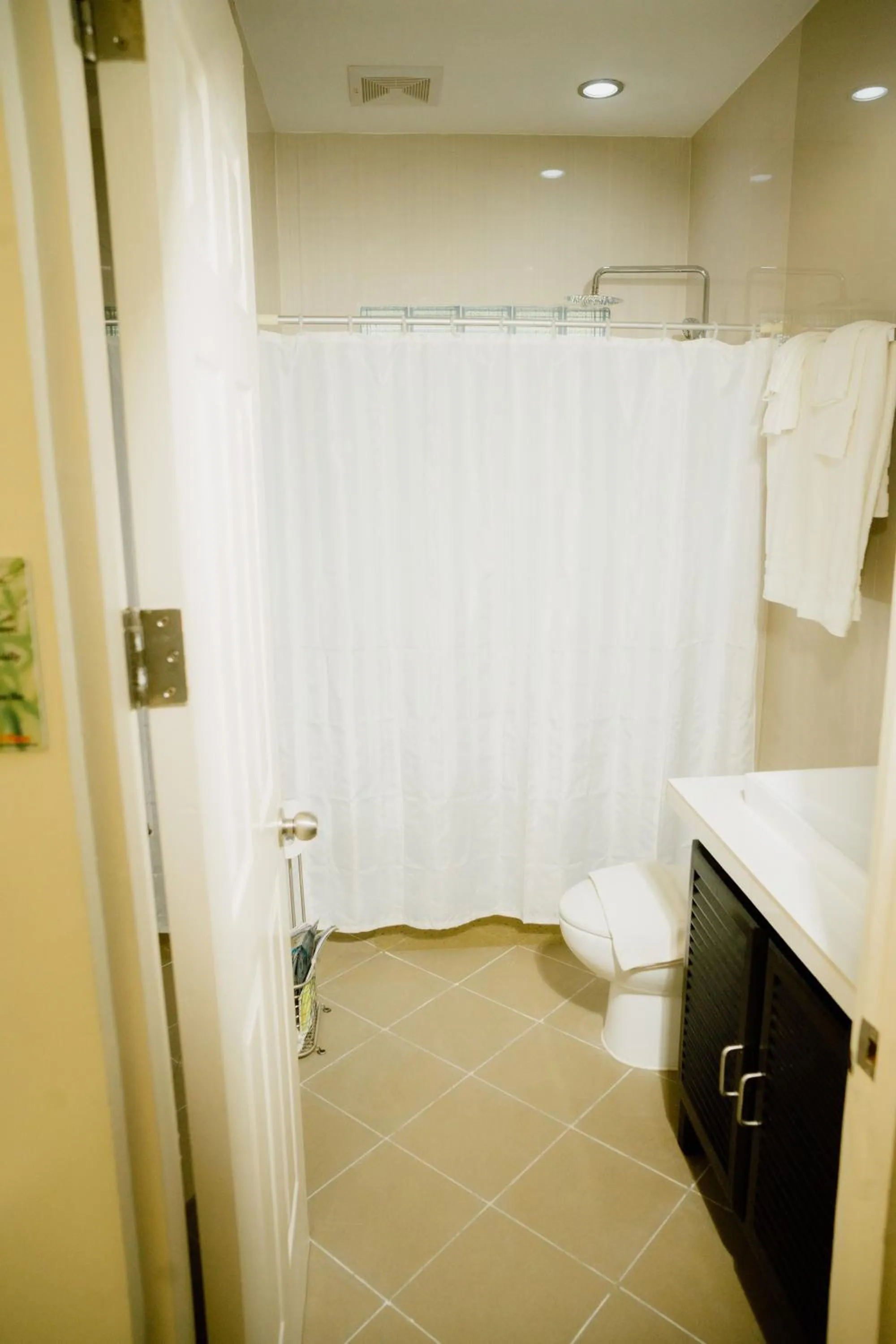 Shower in AJ's Place Beach Resort