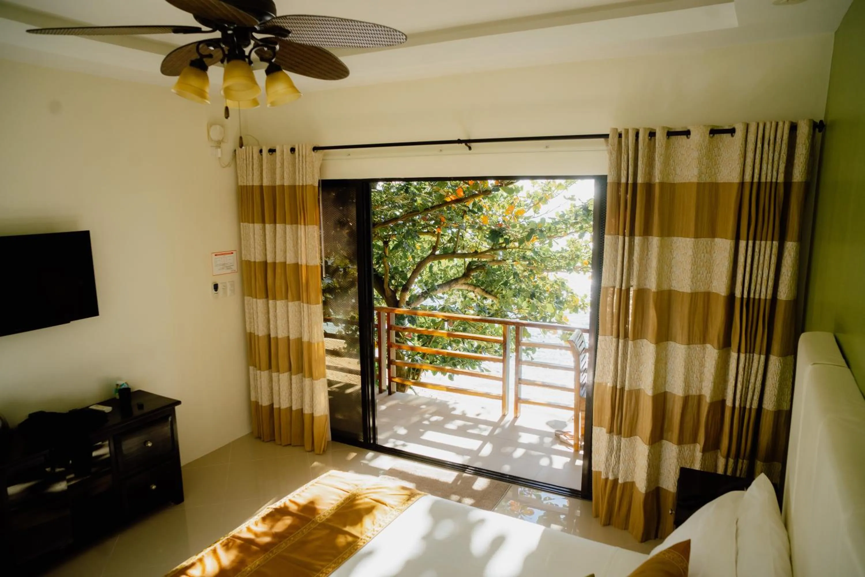 View (from property/room), Bed in AJ's Place Beach Resort