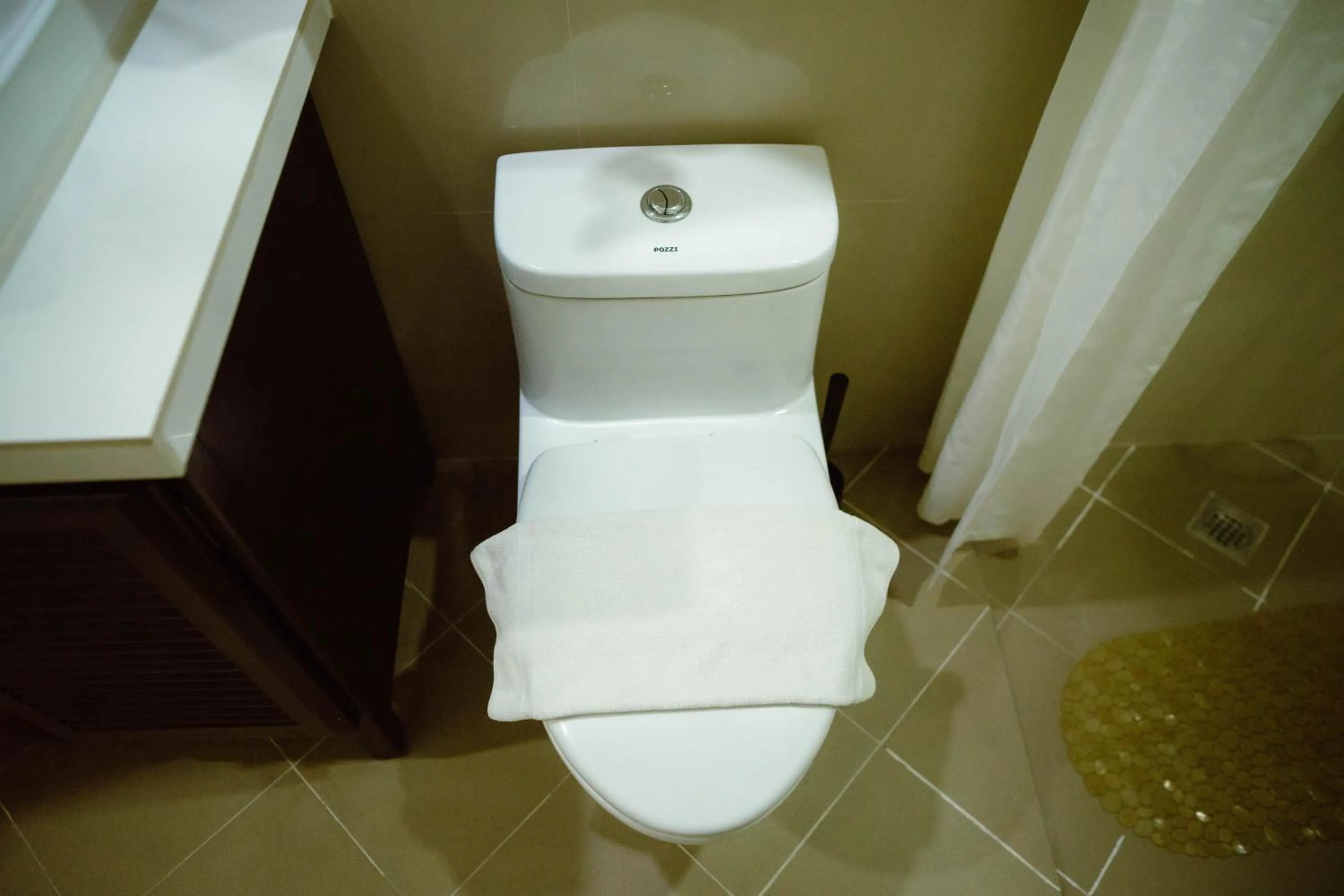 Toilet in AJ's Place Beach Resort