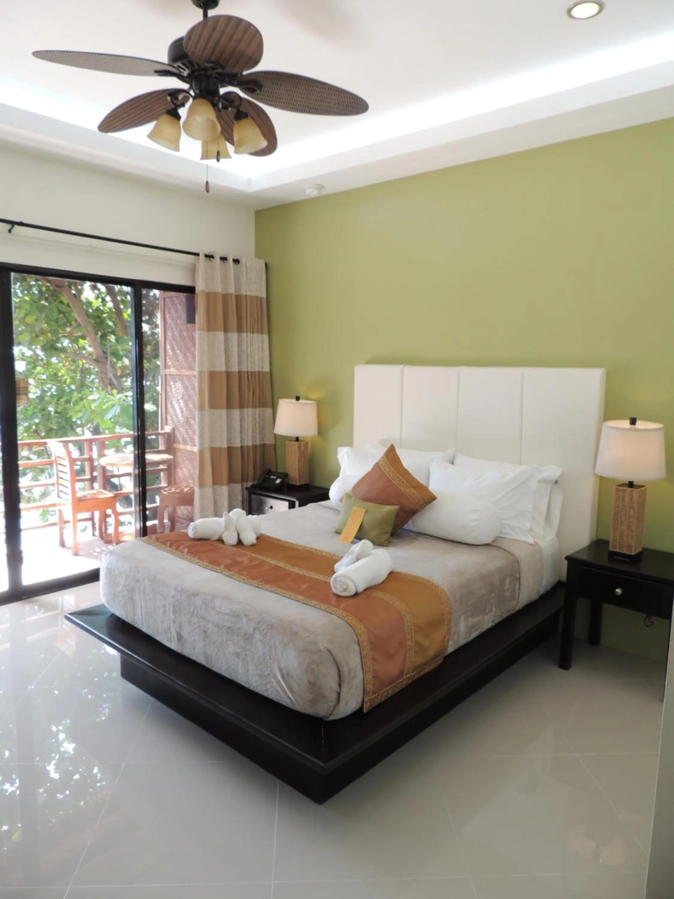 Bed in AJ's Place Beach Resort