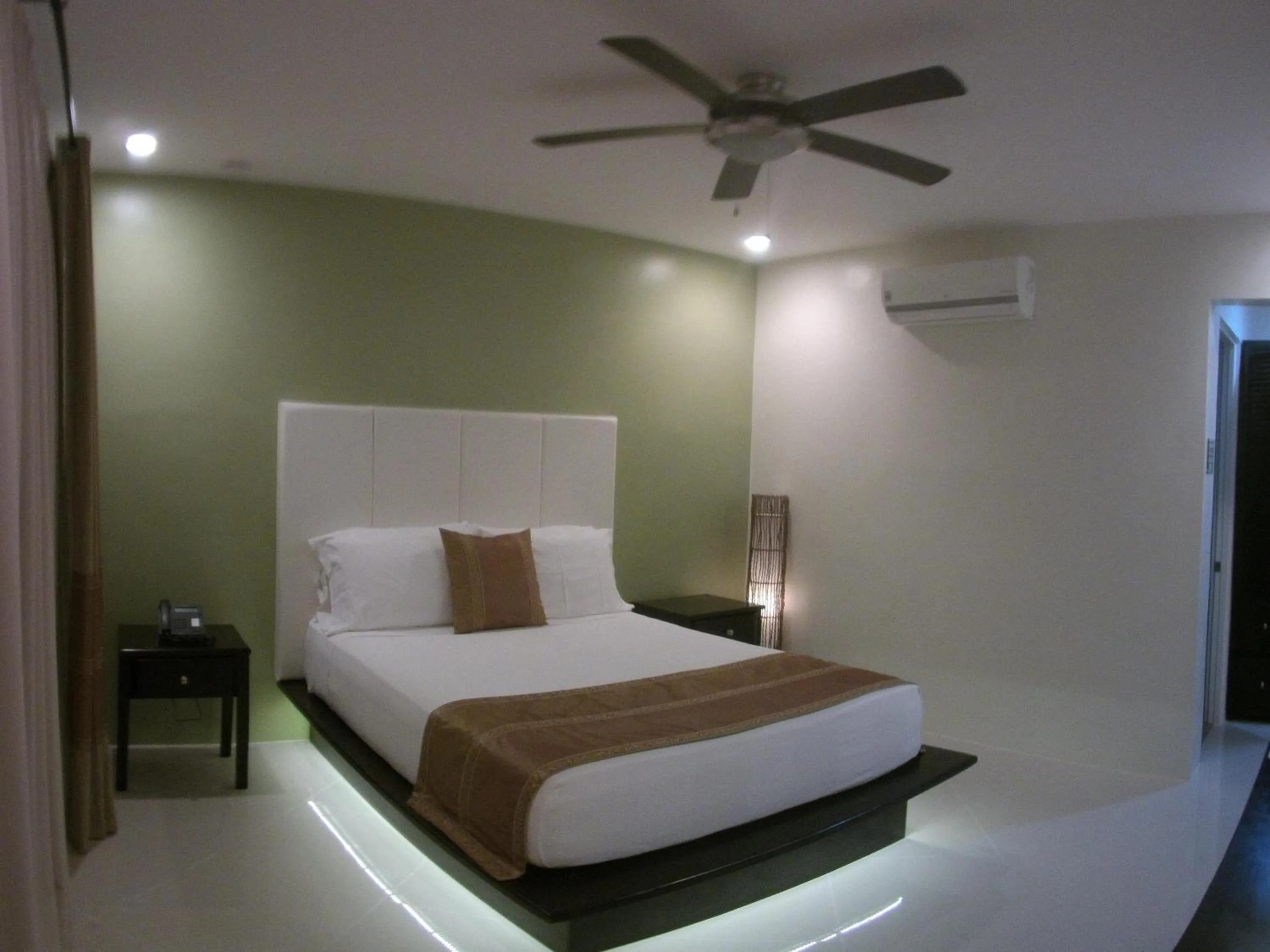 Bed in AJ's Place Beach Resort