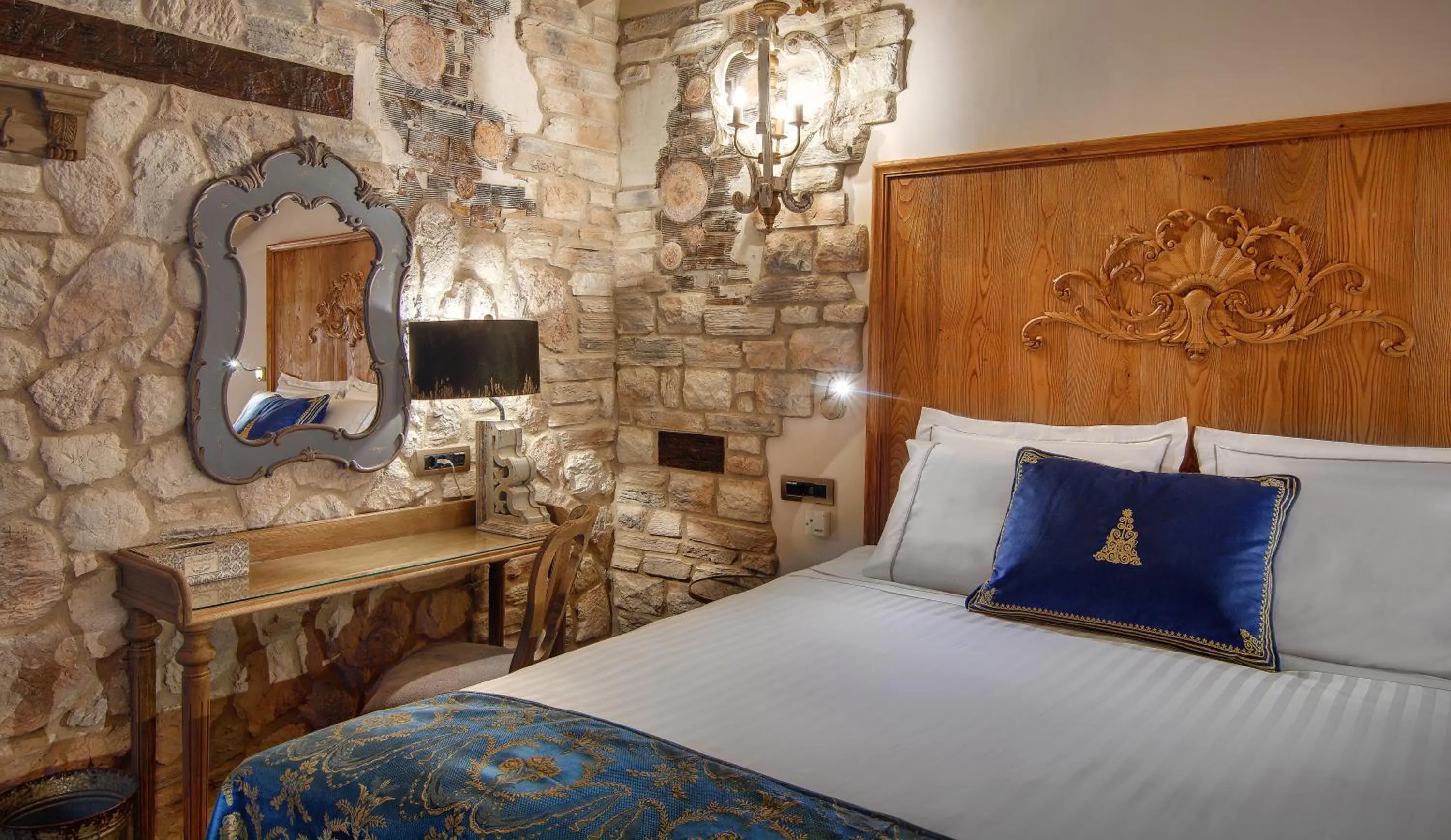 Bed in KAMARES Historic Boutique Hotel & Spa