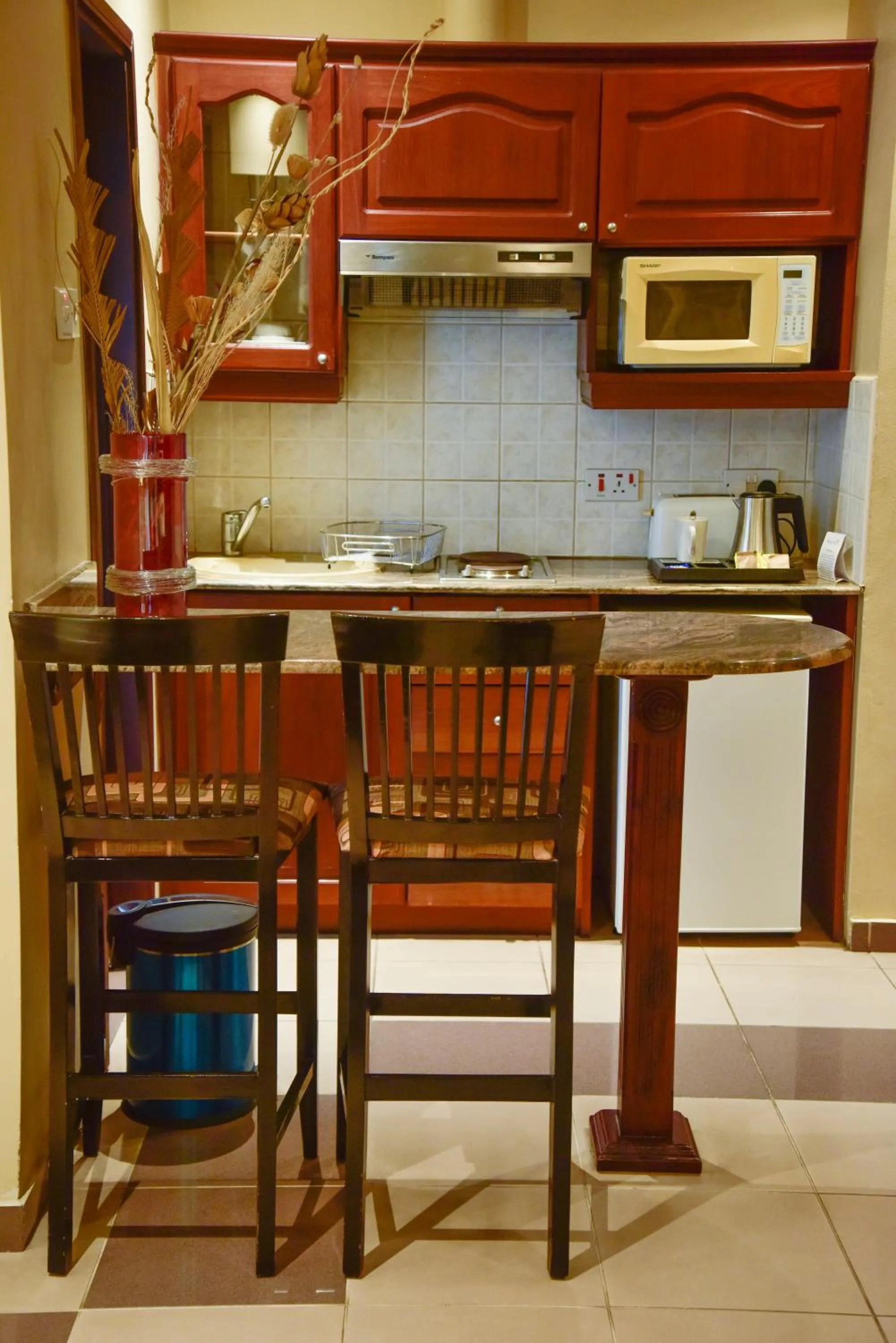 Kitchen or kitchenette in Harbour View Suites