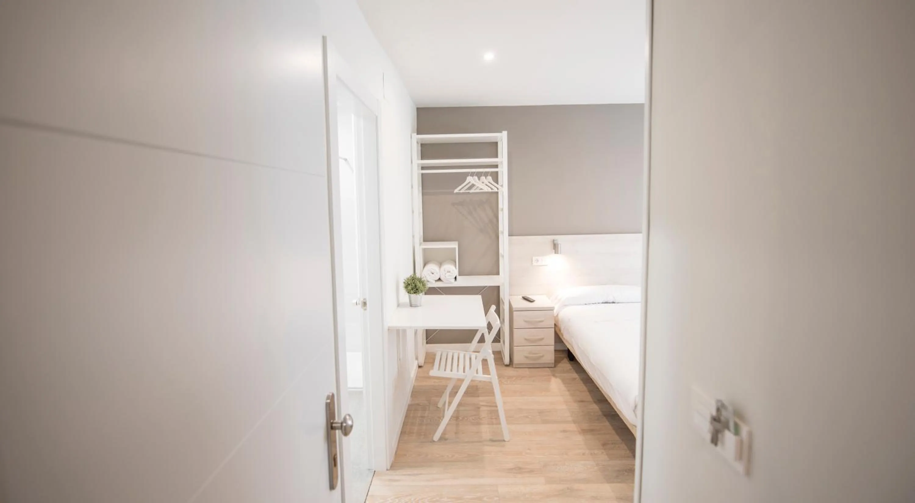 Decorative detail, Bed in Happy Hostal Carrales